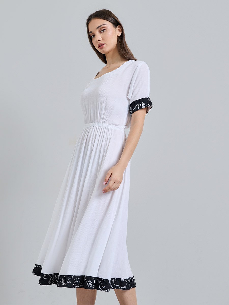 White Solid Round Neck Fit and Flare Knee length Dress