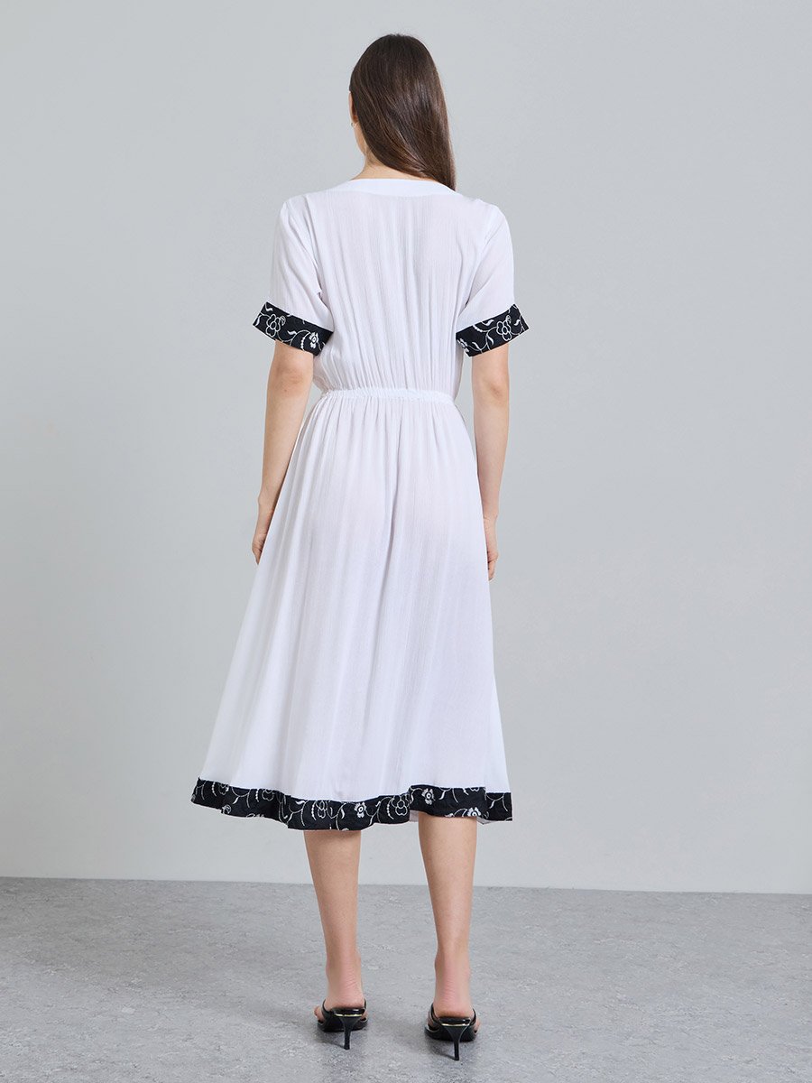 White Solid Round Neck Fit and Flare Knee length Dress
