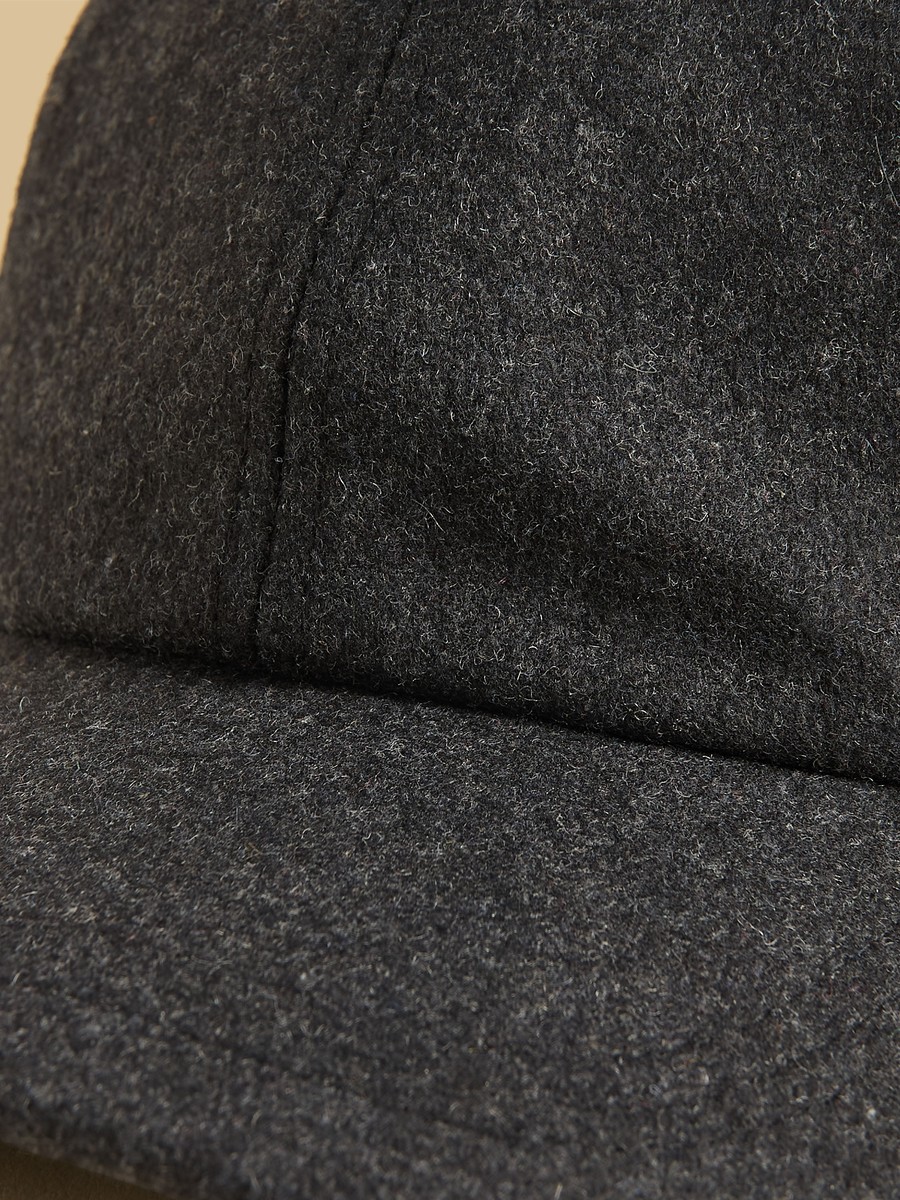 Textured Cap with Buckled Strap Closure