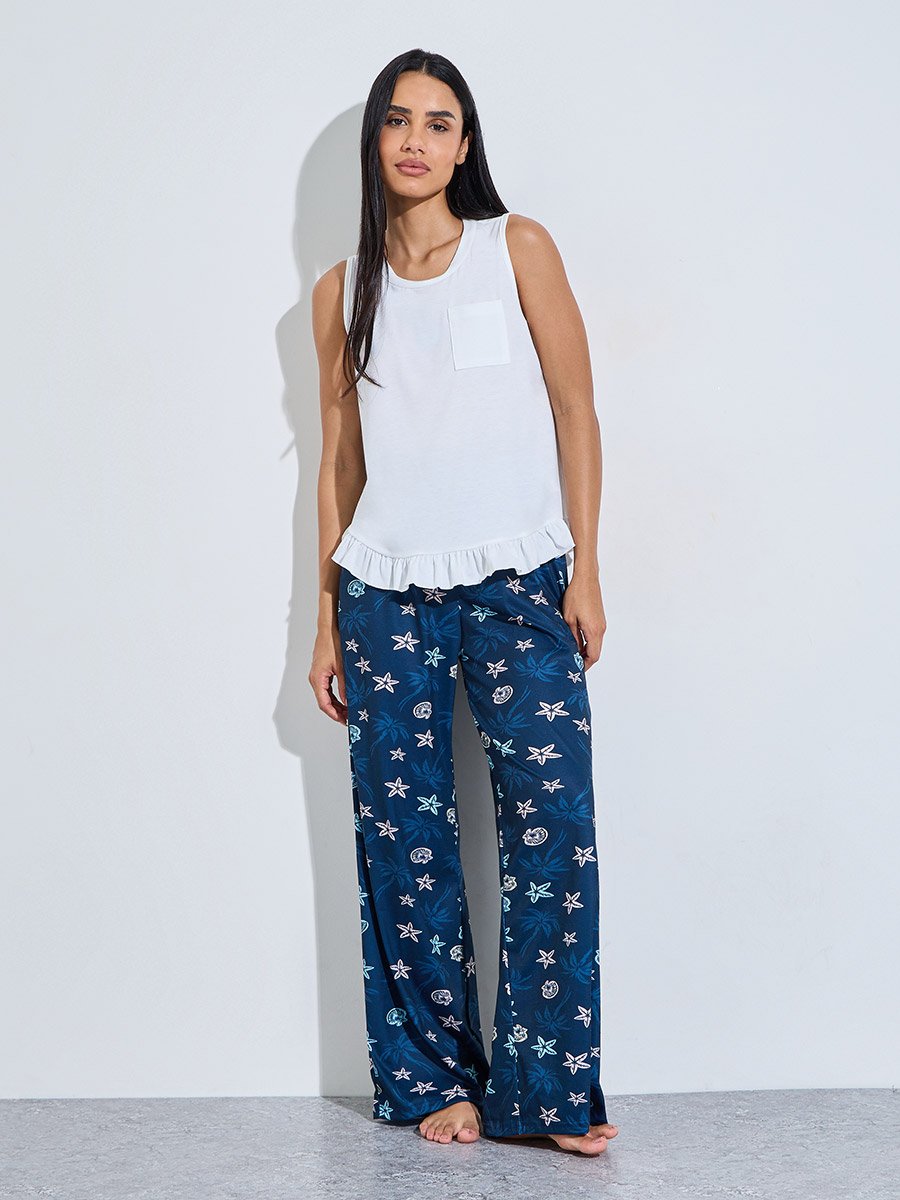 White Solid Ruffle Hem Tank Top and Navy Blue All Over Print Straight Pants Pyjama Set