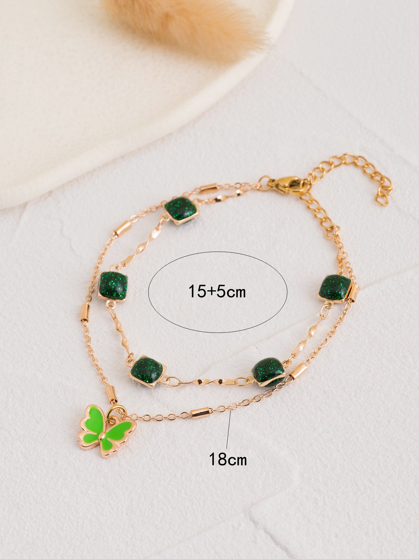 Gold Tone Green Gem and Butterfly Multistrand Bracelet