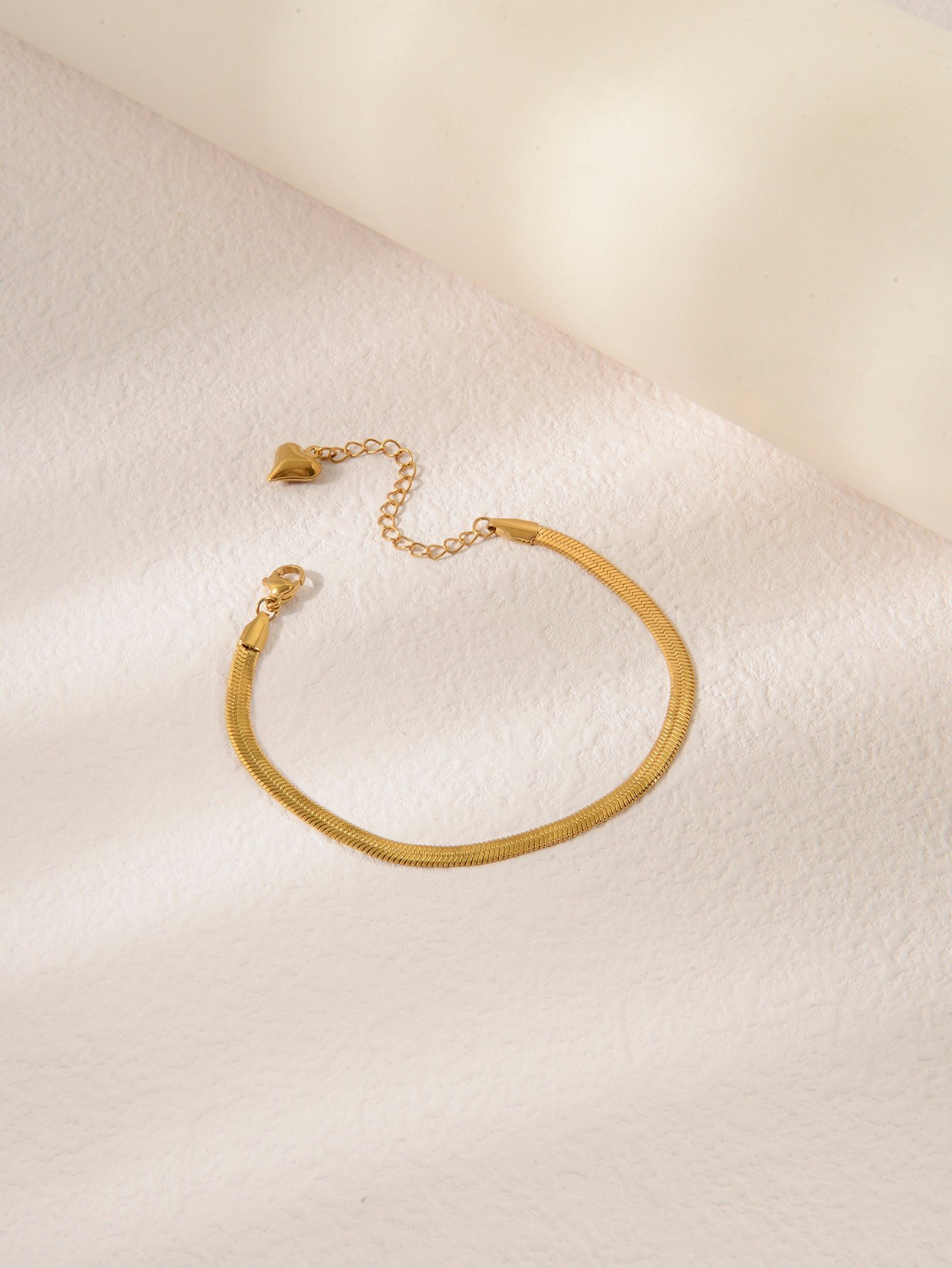 Gold Tone Flat Snake Chain Bracelet with Heart Charm
