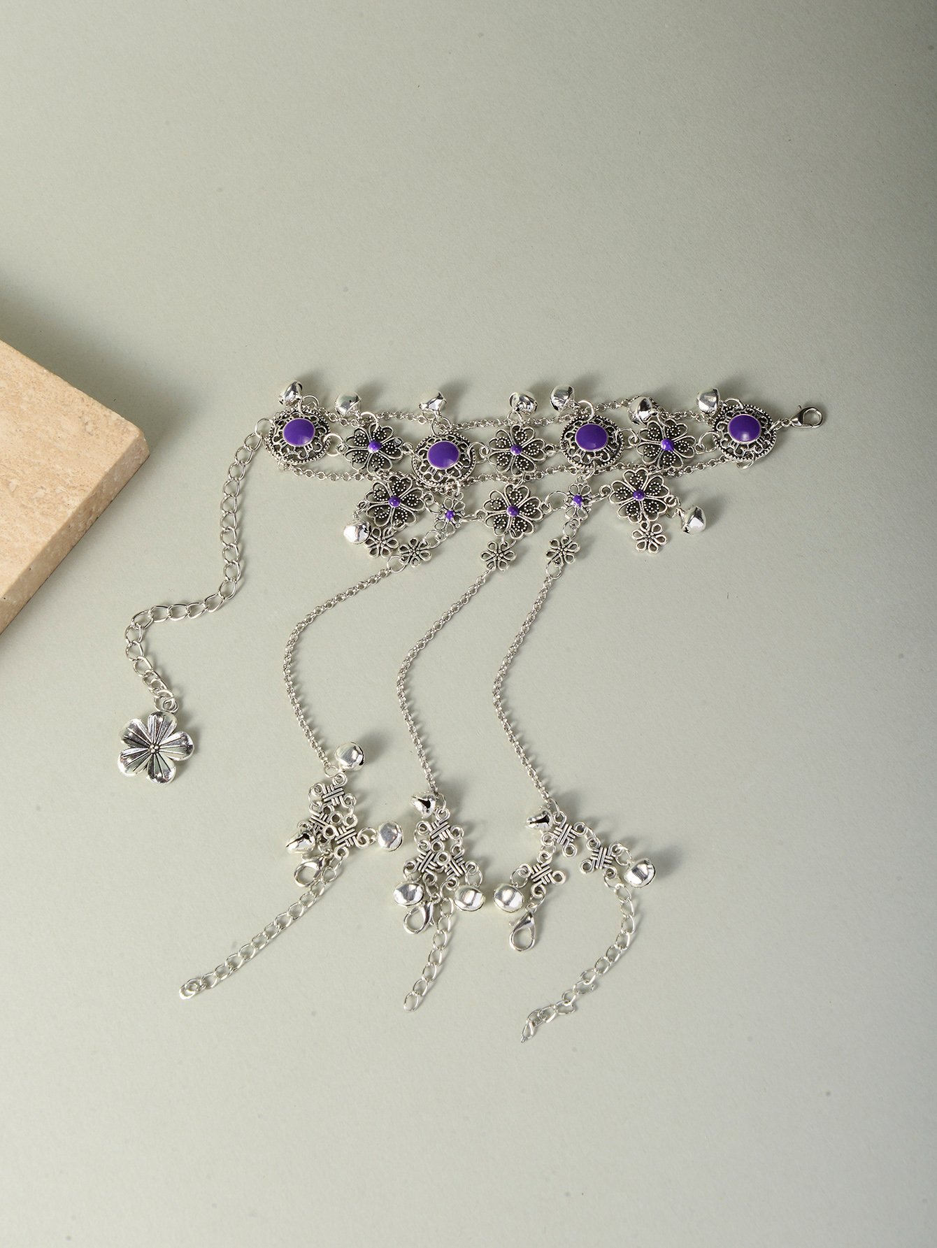 Silver Tone Purple Floral Accents and Bells Hand Chain Bracelet