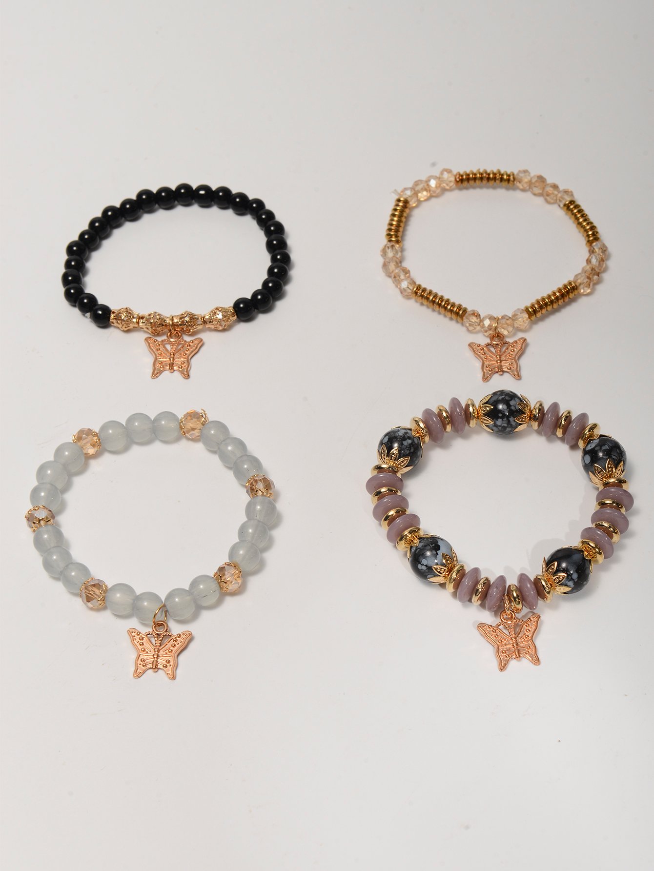 Pack of 4 - Multi-Color Beaded Bracelets with Butterfly Charms