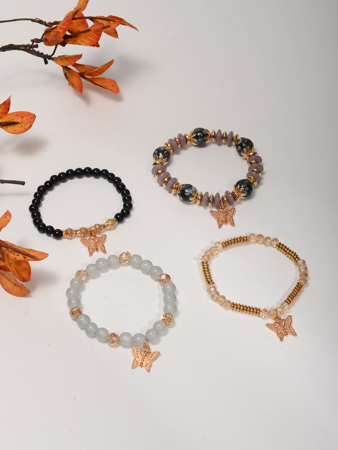 Pack of 4 - Multi-Color Beaded Bracelets with Butterfly Charms