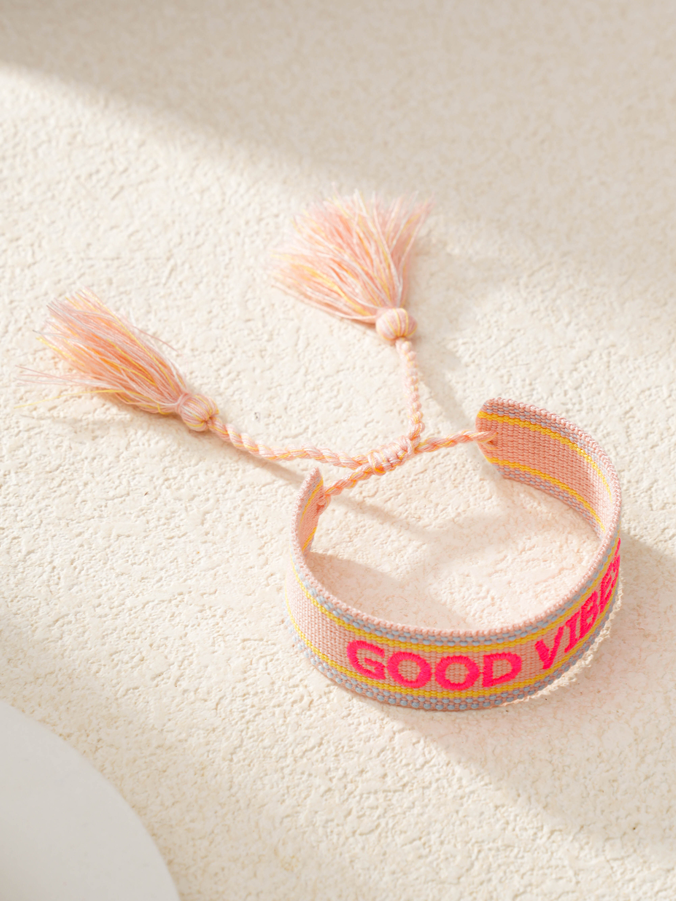 Multi-Color Embroidered Woven Bracelet with Tassel Charm