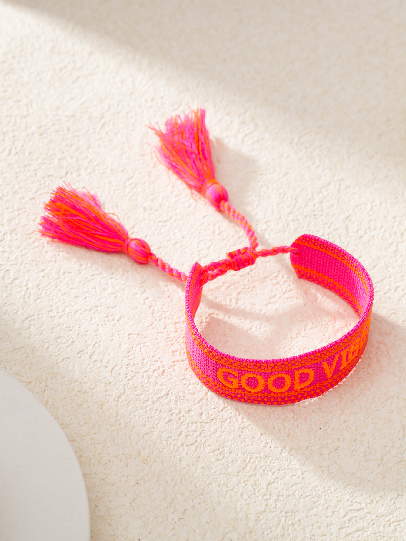 Multi-Color Embroidered Woven Bracelet with Tassel Charm