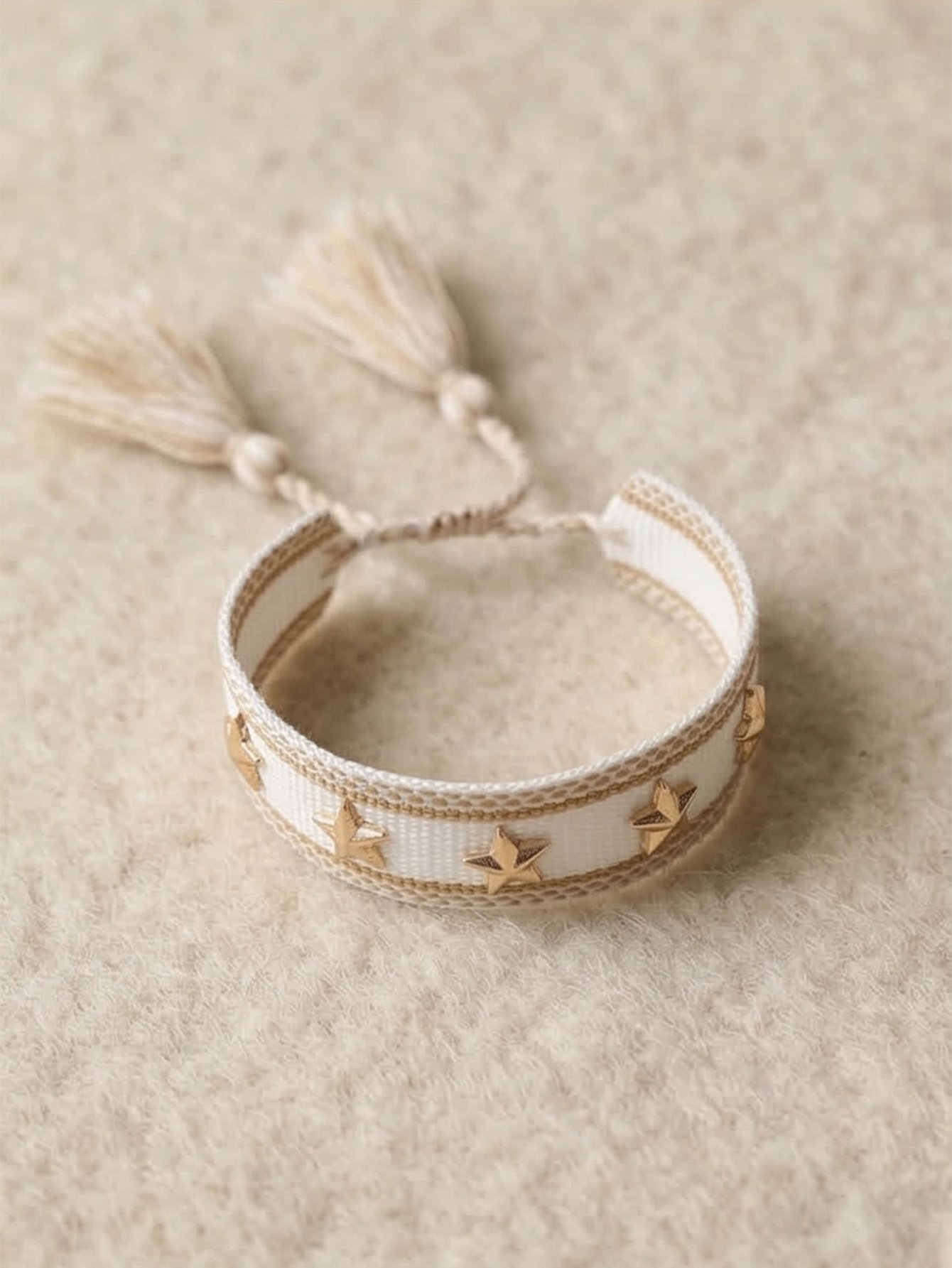 Multi-Color Star Embellished Woven Bracelet with Tassel Charm