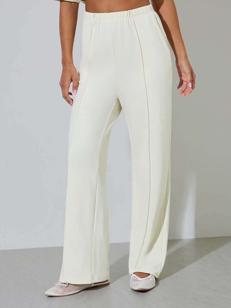 Cream Solid Pleated Details Wide Leg Joggers