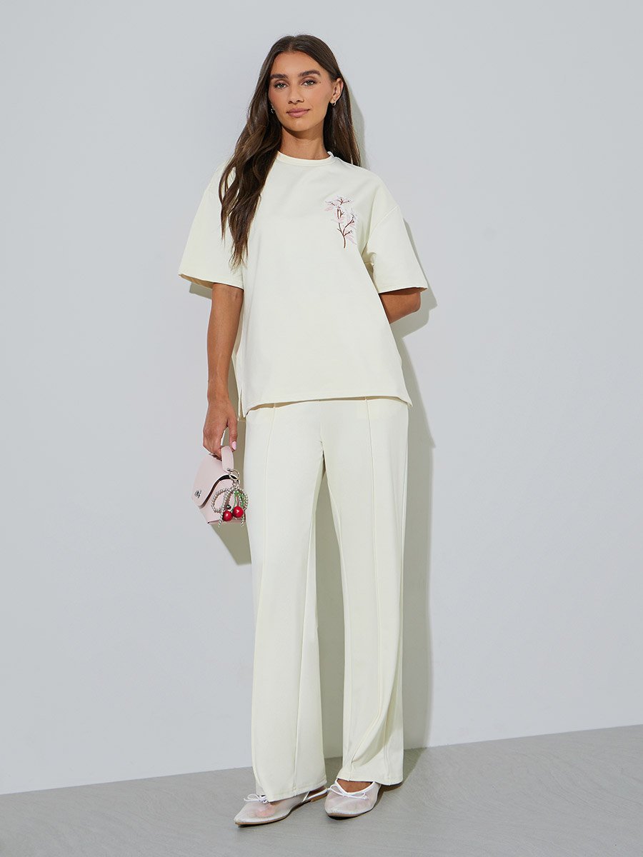 Cream Solid Pleated Details Wide Leg Joggers