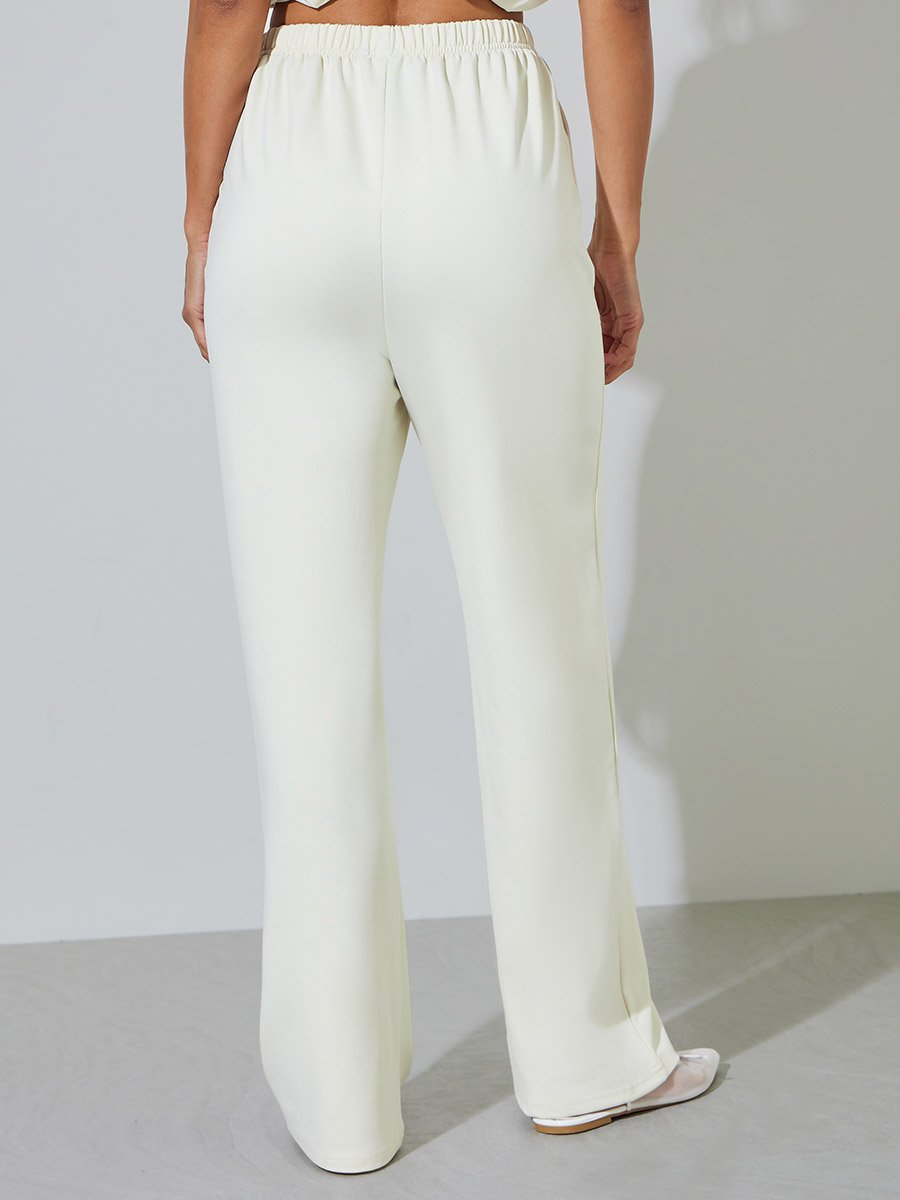 Cream Solid Pleated Details Wide Leg Joggers