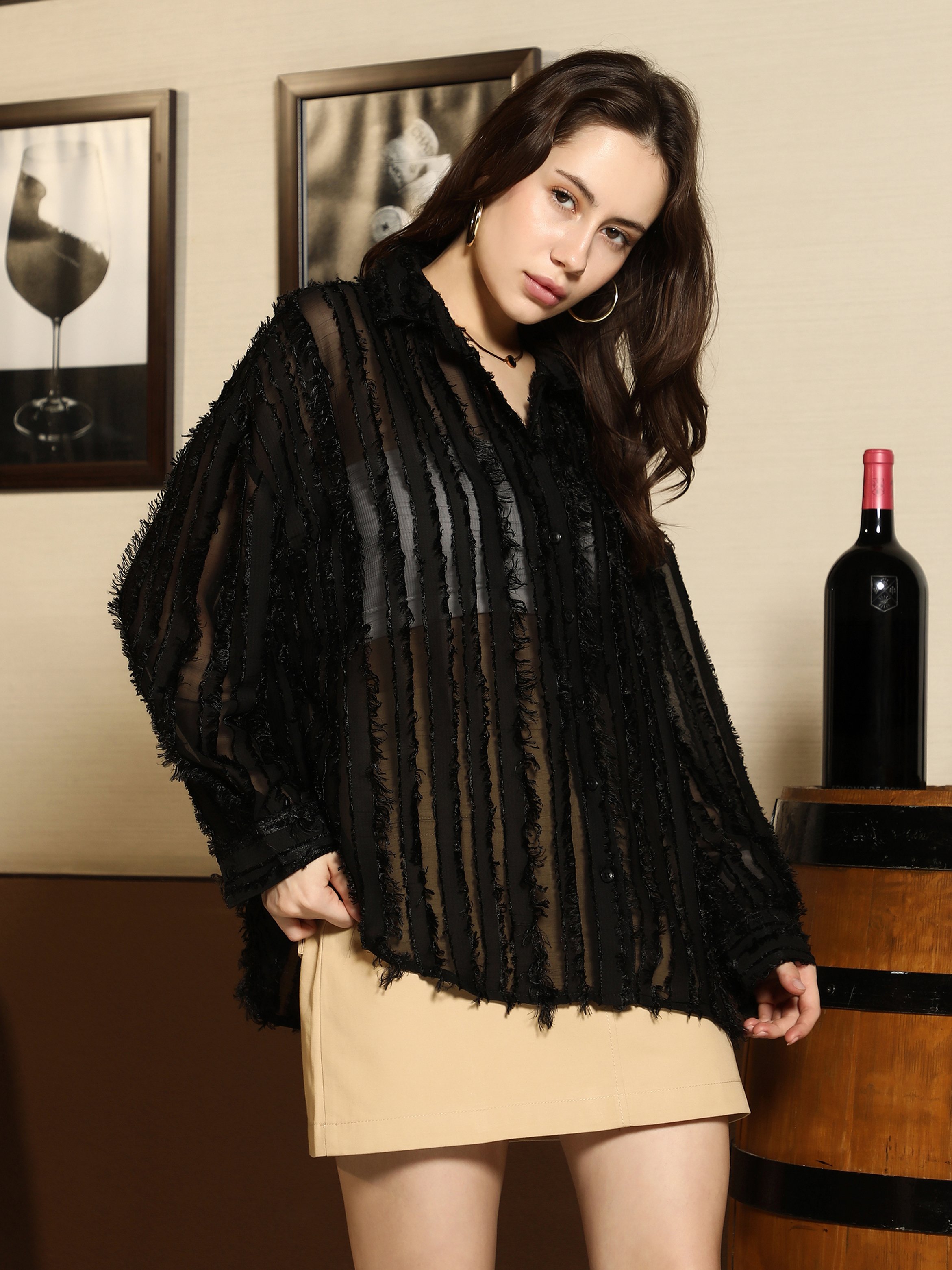 بلوزة فضفاضة بتفاصيل مخططة