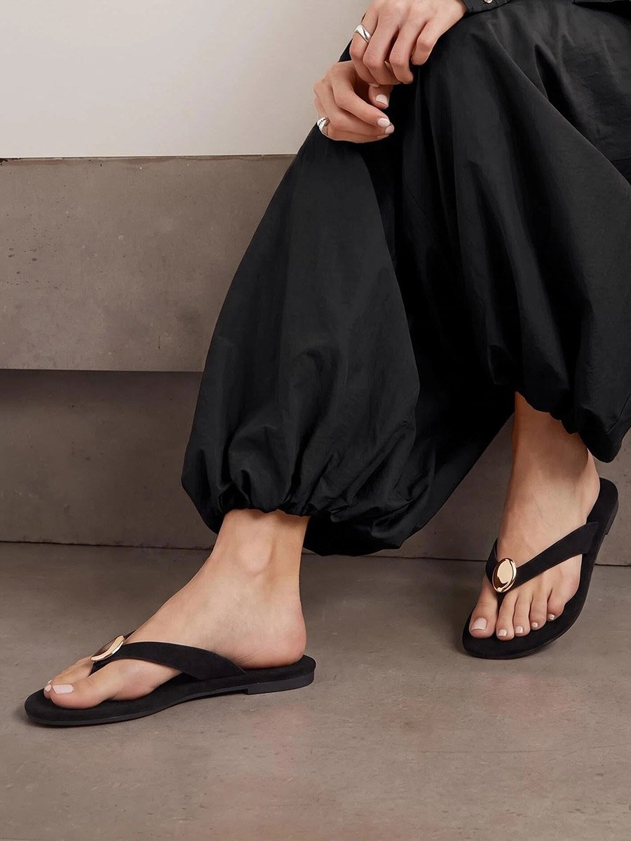Black Flat Flip-Flops with Gold Tone Metallic Detail