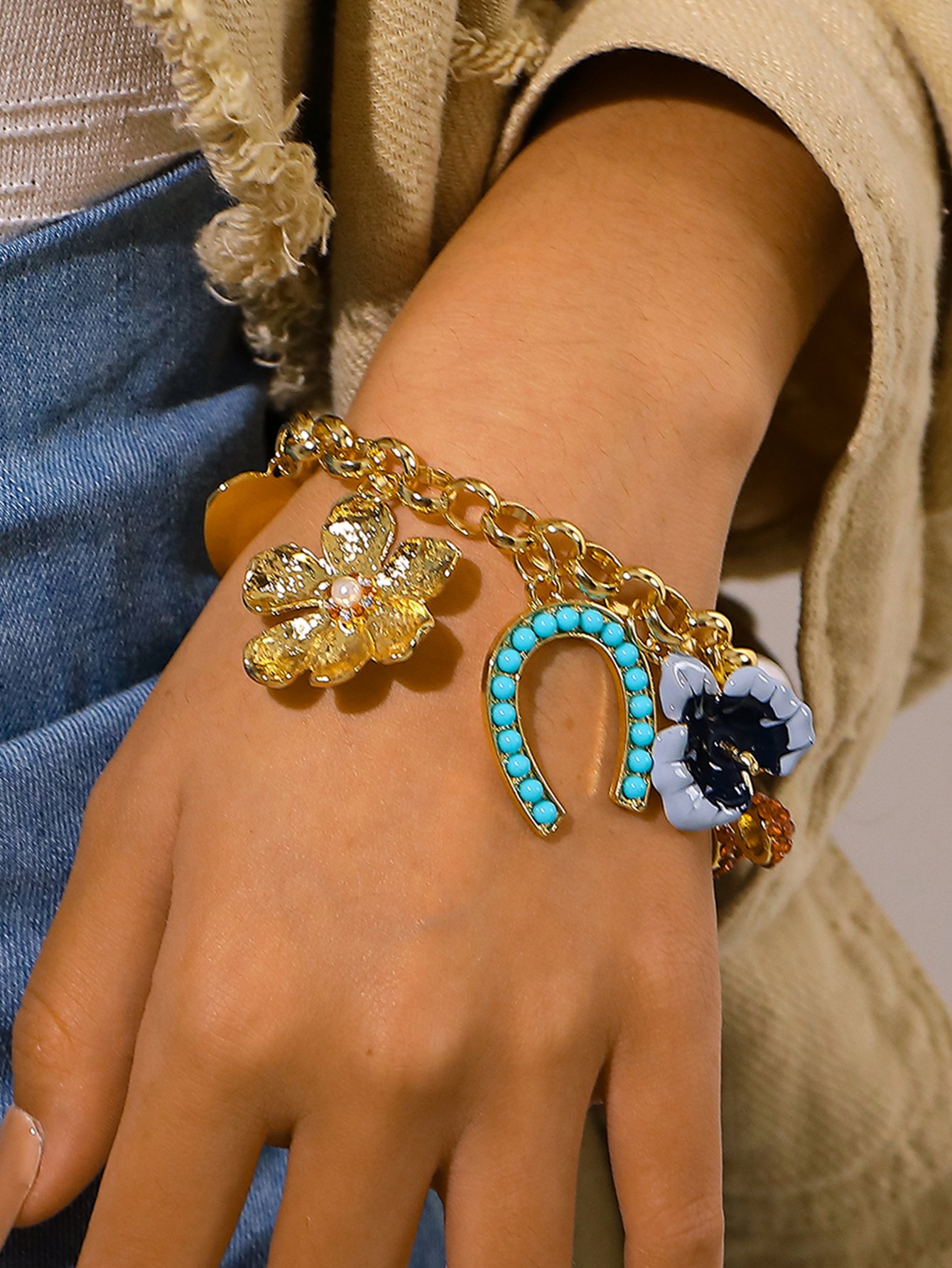 Gold Tone Multi-Charm Bracelet