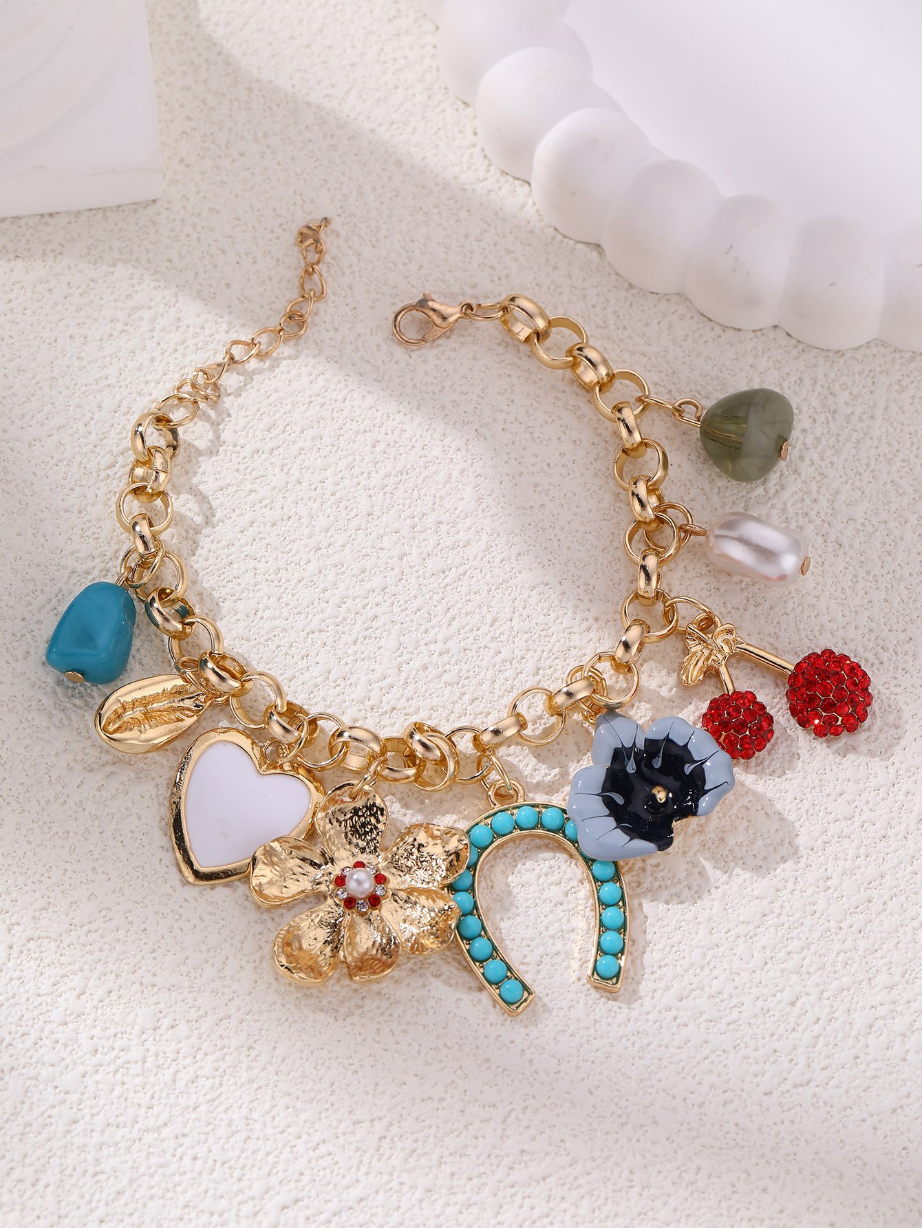 Gold Tone Multi-Charm Bracelet
