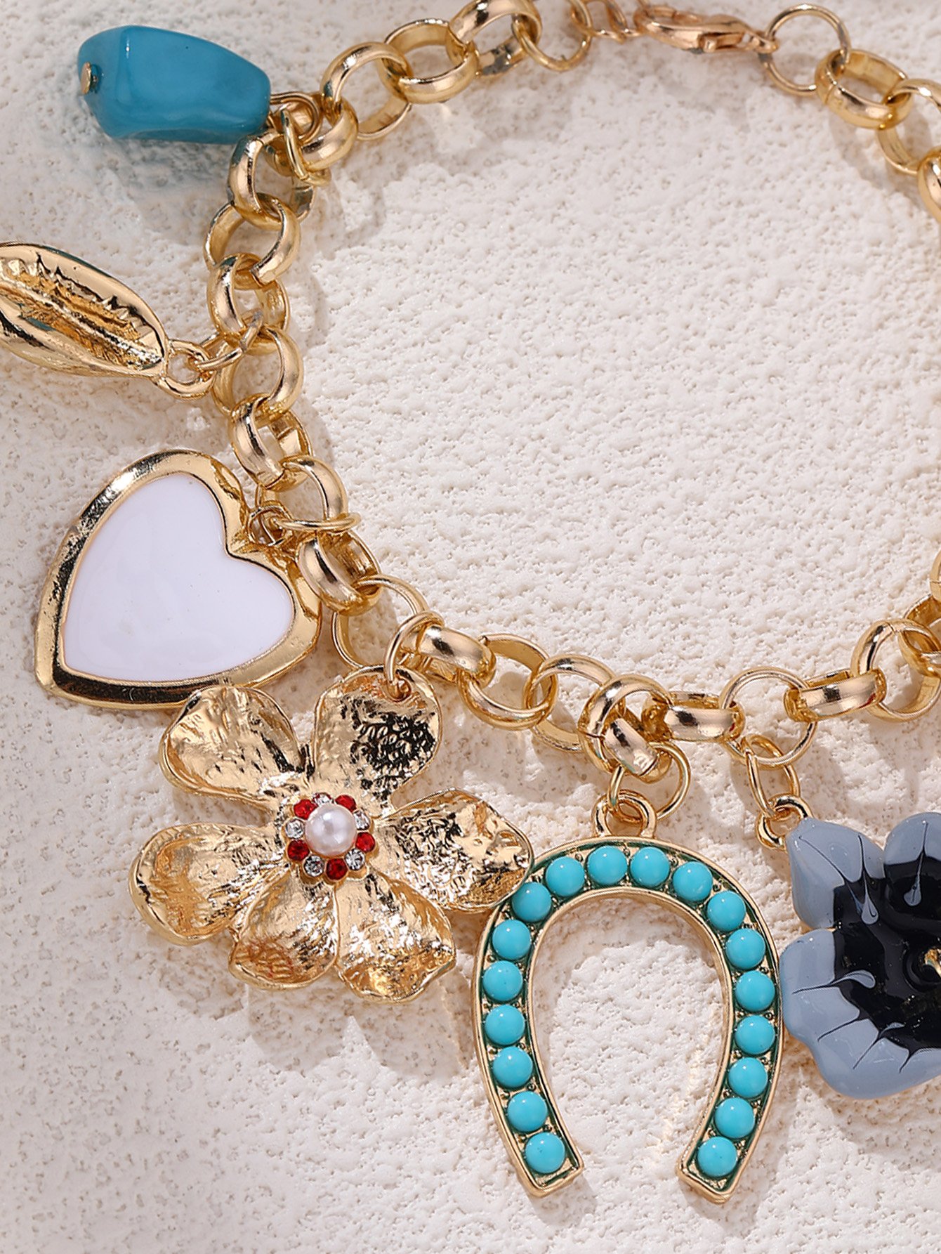 Gold Tone Multi-Charm Bracelet