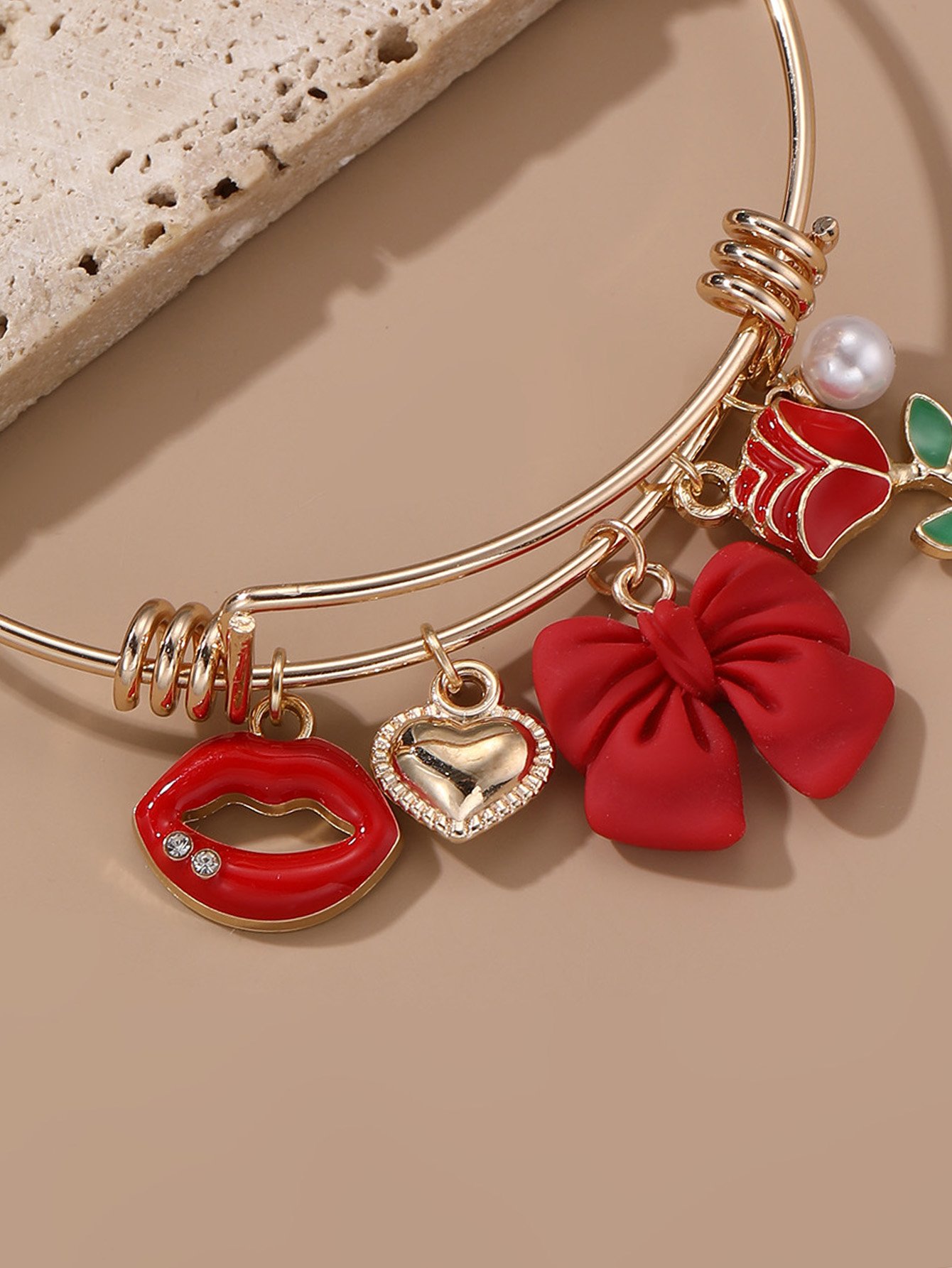Red Charm Bangle Bracelet  with Bow and Lip Design