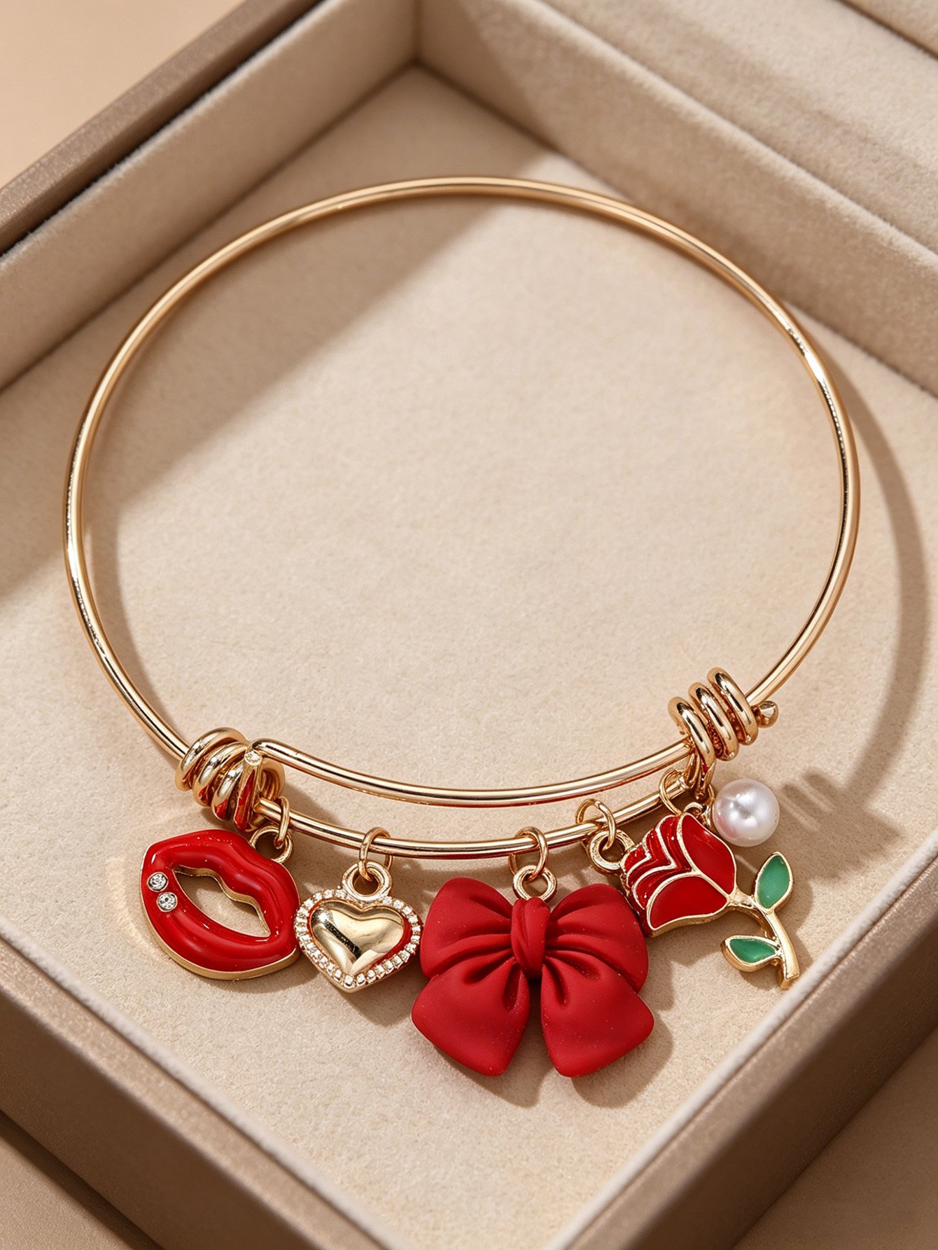 Red Charm Bangle Bracelet  with Bow and Lip Design
