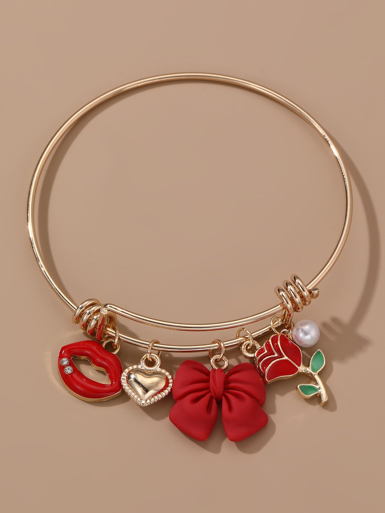 Red Charm Bangle Bracelet  with Bow and Lip Design