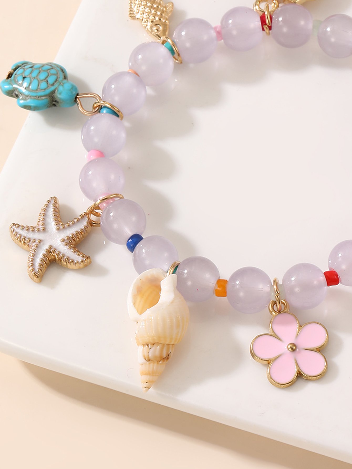 Multi-Charm Beaded Bracelet