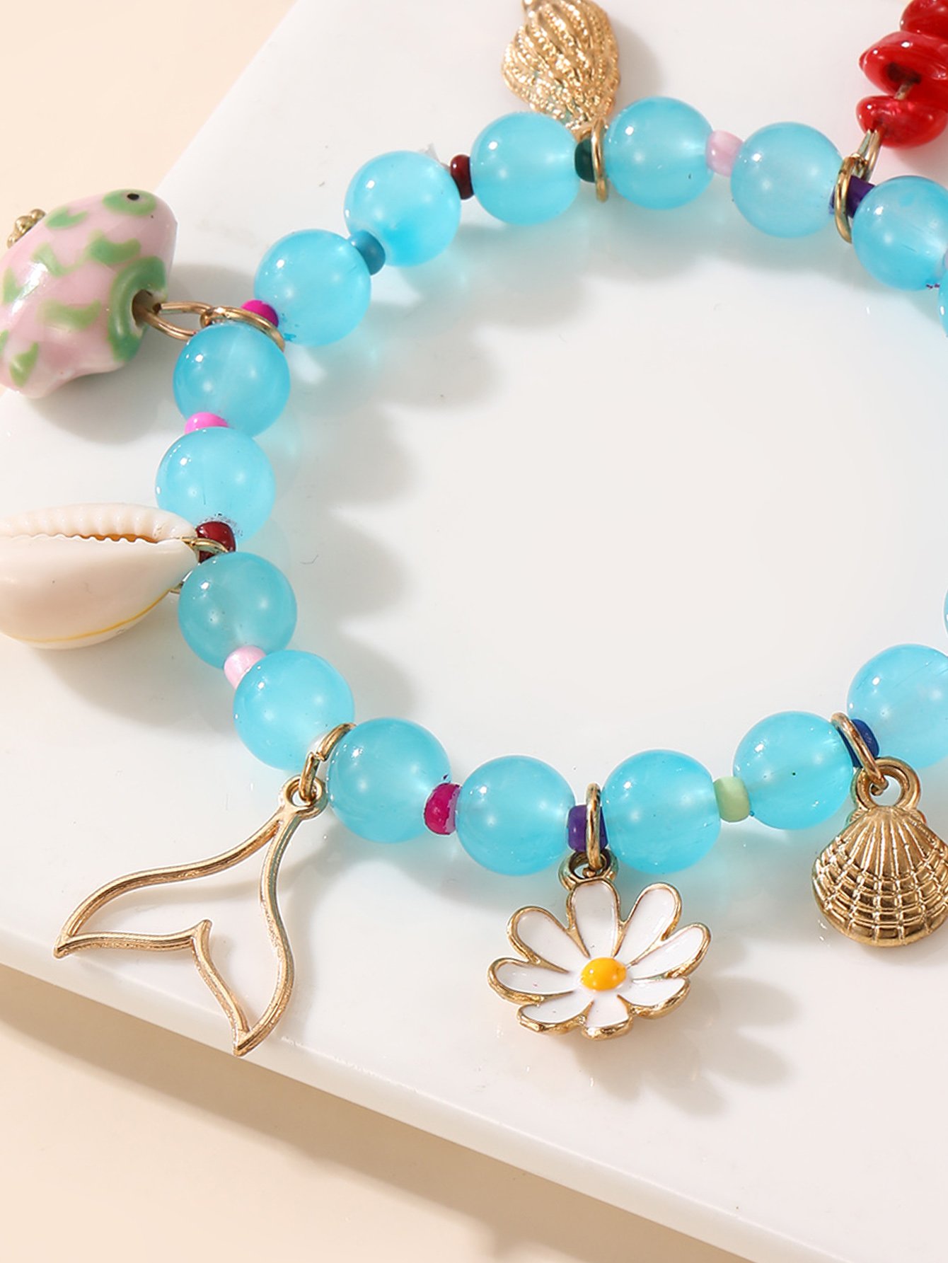\Multi-Charm Beaded Bangle Bracelet