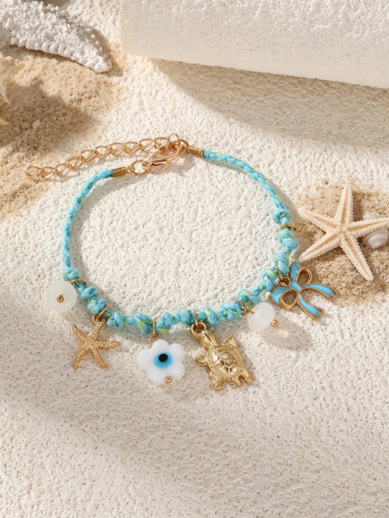 Blue Braided Charm Bracelet with Evil Eye Flower and Turtle