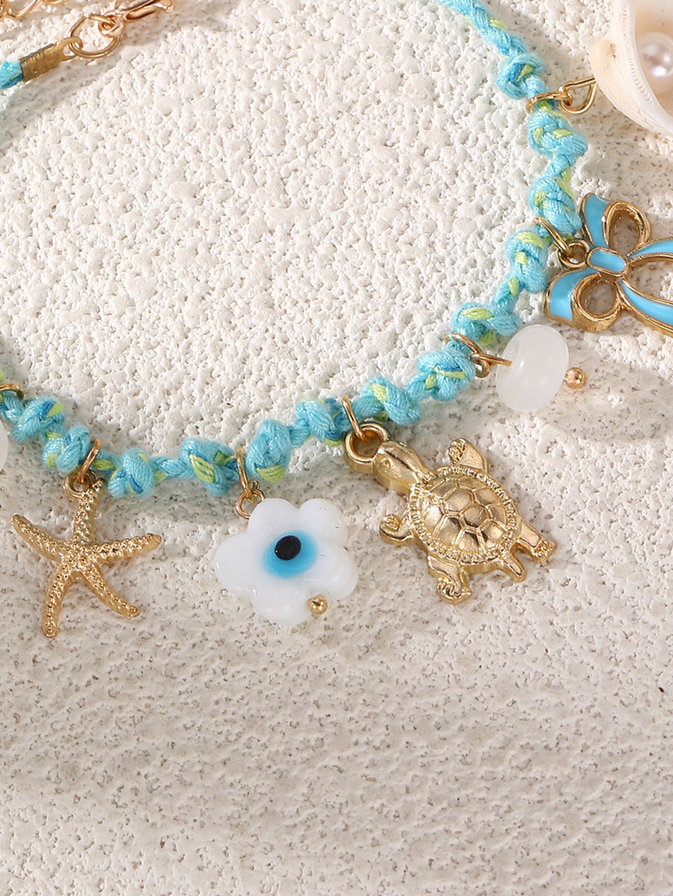 Blue Braided Charm Bracelet with Evil Eye Flower and Turtle