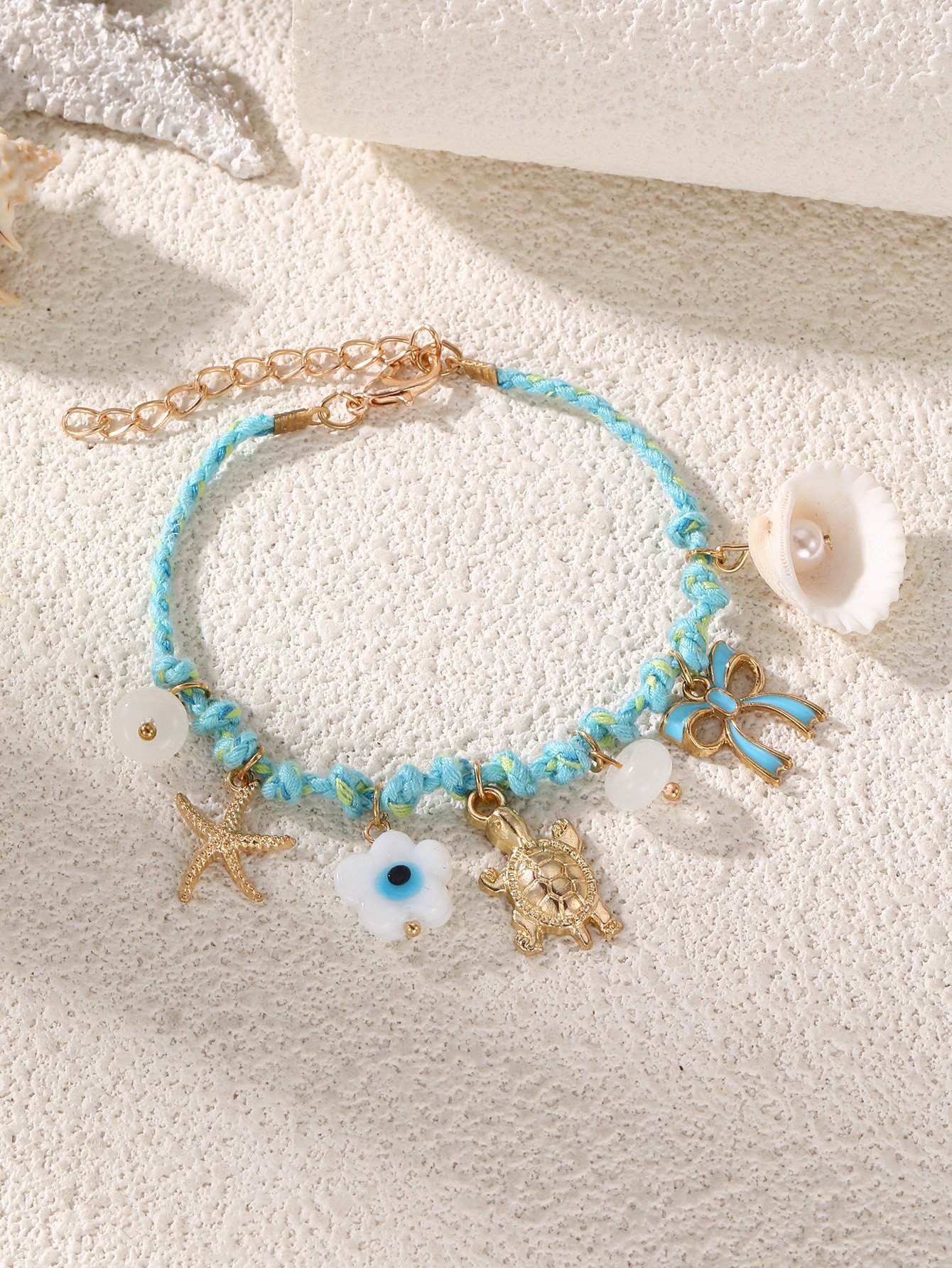 Blue Braided Charm Bracelet with Evil Eye Flower and Turtle