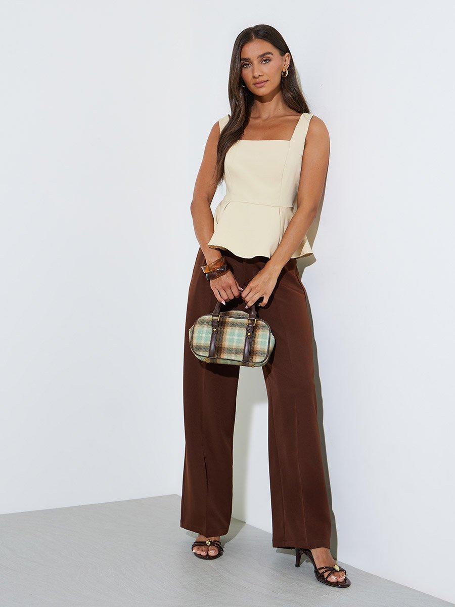 Yellow Solid Ruffle Details Sleeveless Peplum Blouse