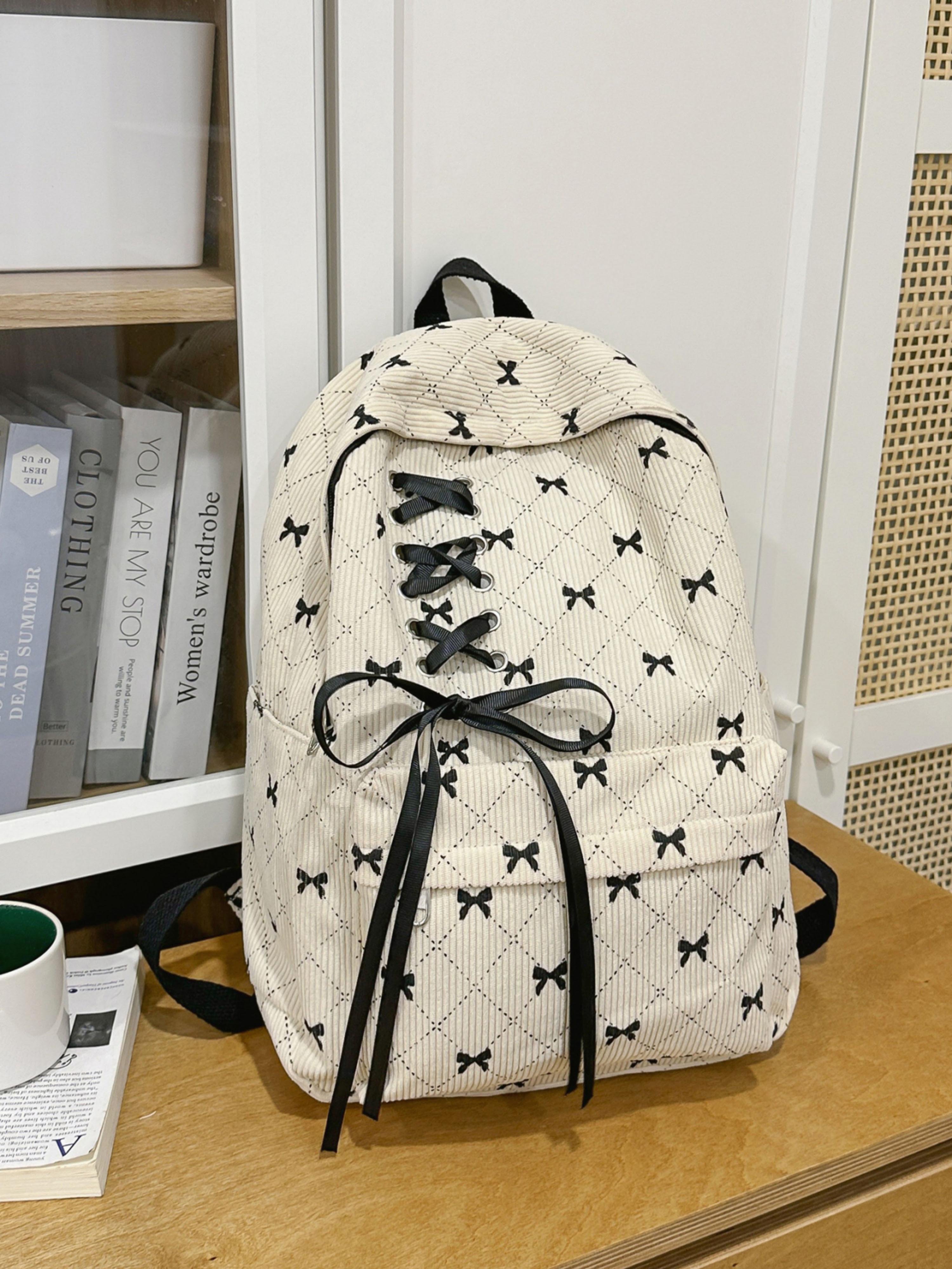 شنطة ظهر مخمل أبيض بتصميم فيونكة