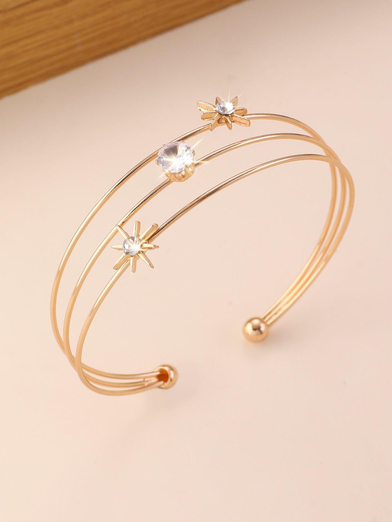 Gold Starburst and Solitaire Bangle Bracelet