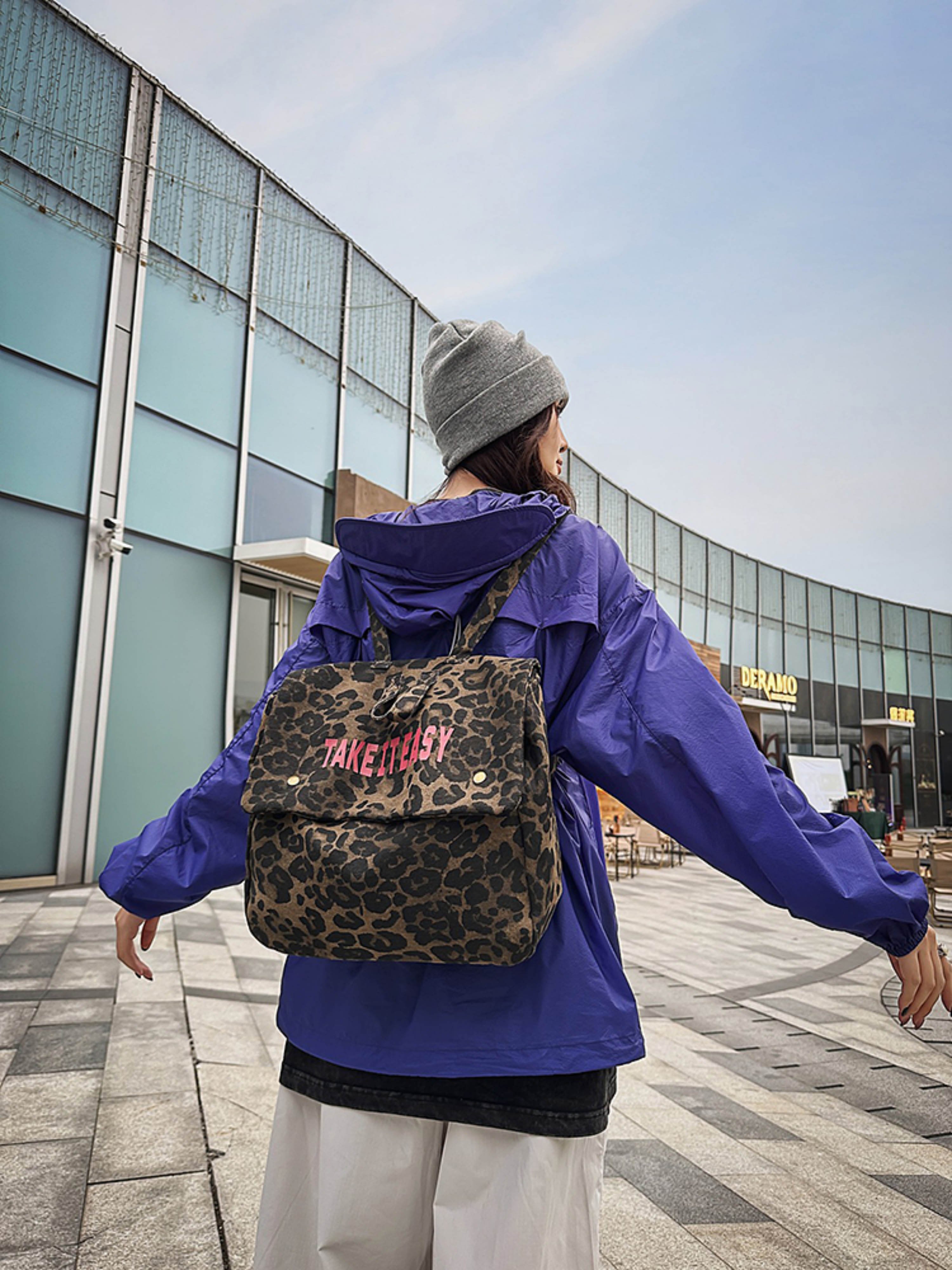 Leopard Print Canvas Backpack with Take It Easy Slogan
