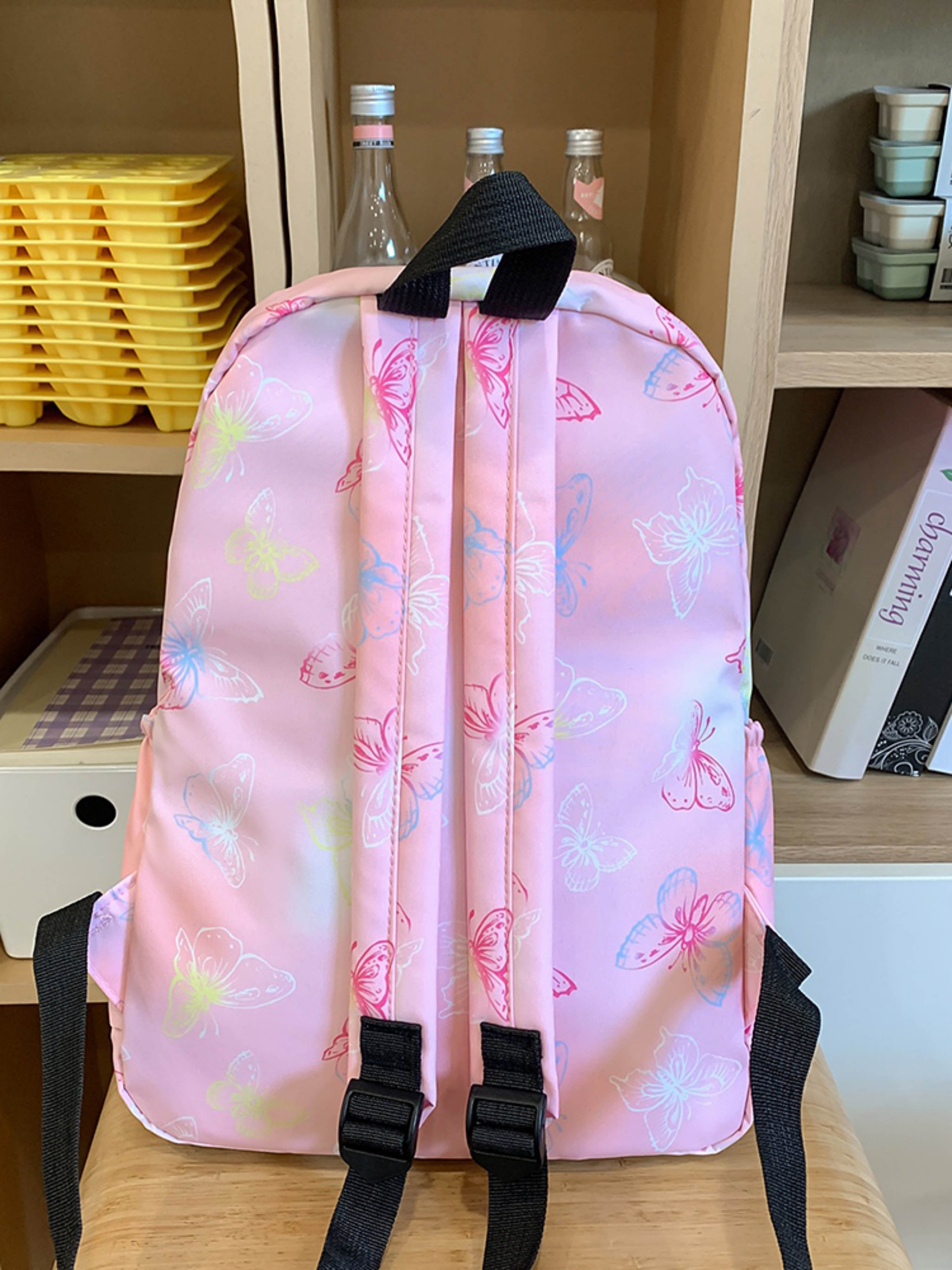 شنطة ظهر بنمط فراشة باللون الوردي