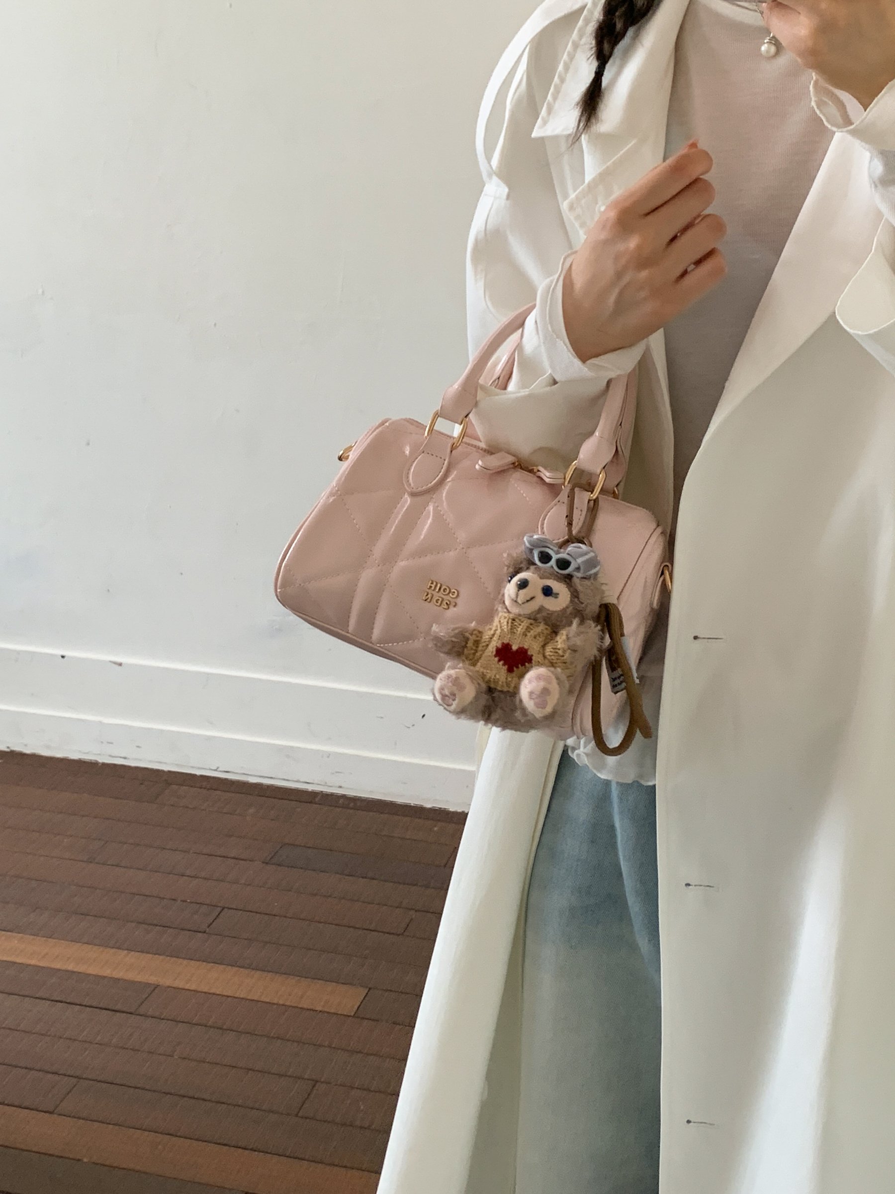 Pink Quilted Handbag with Charm
