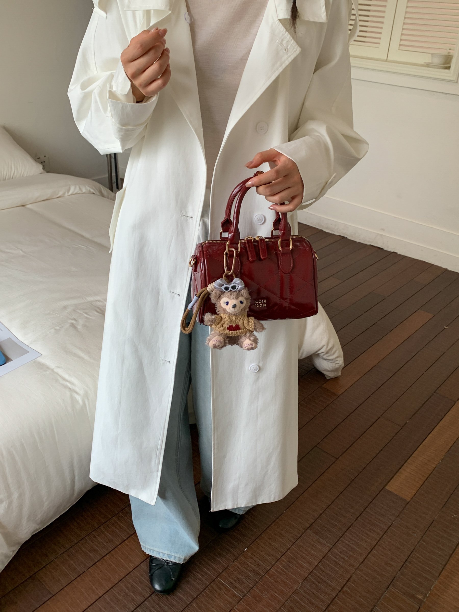 Red Quilted Handbag with Pendant Charm