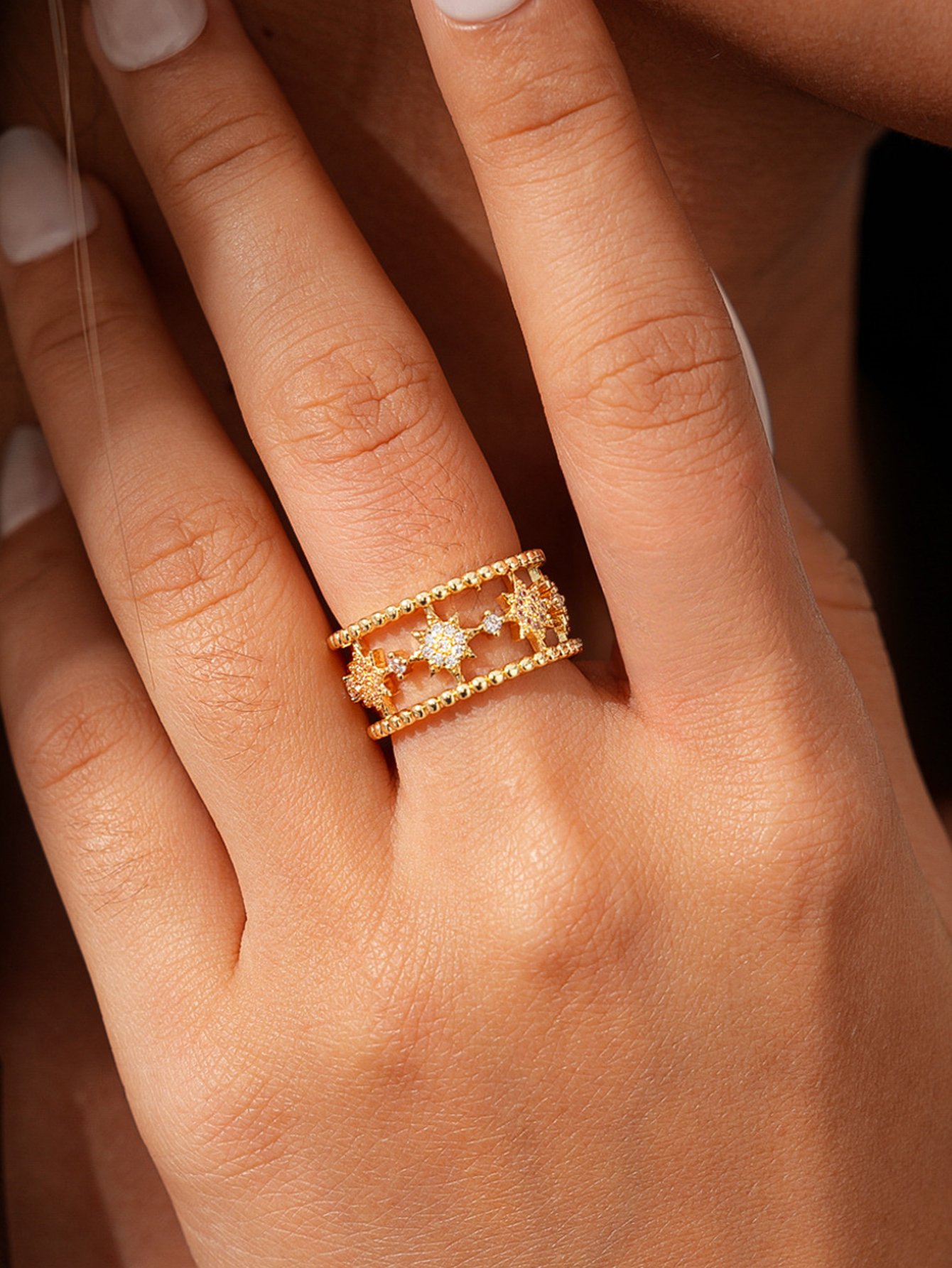Gold Tone Starburst Motif Ring