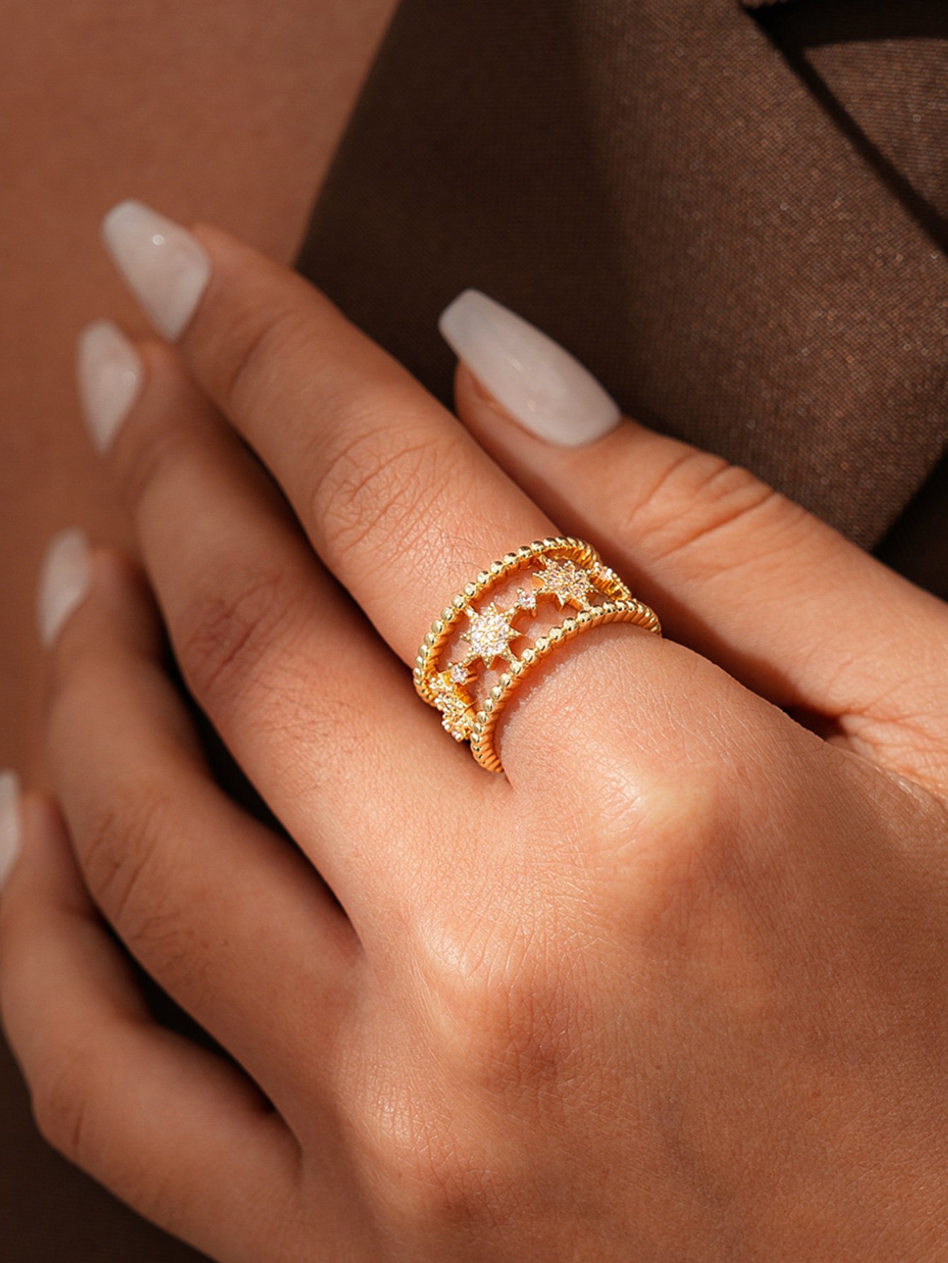 Gold Tone Starburst Motif Ring