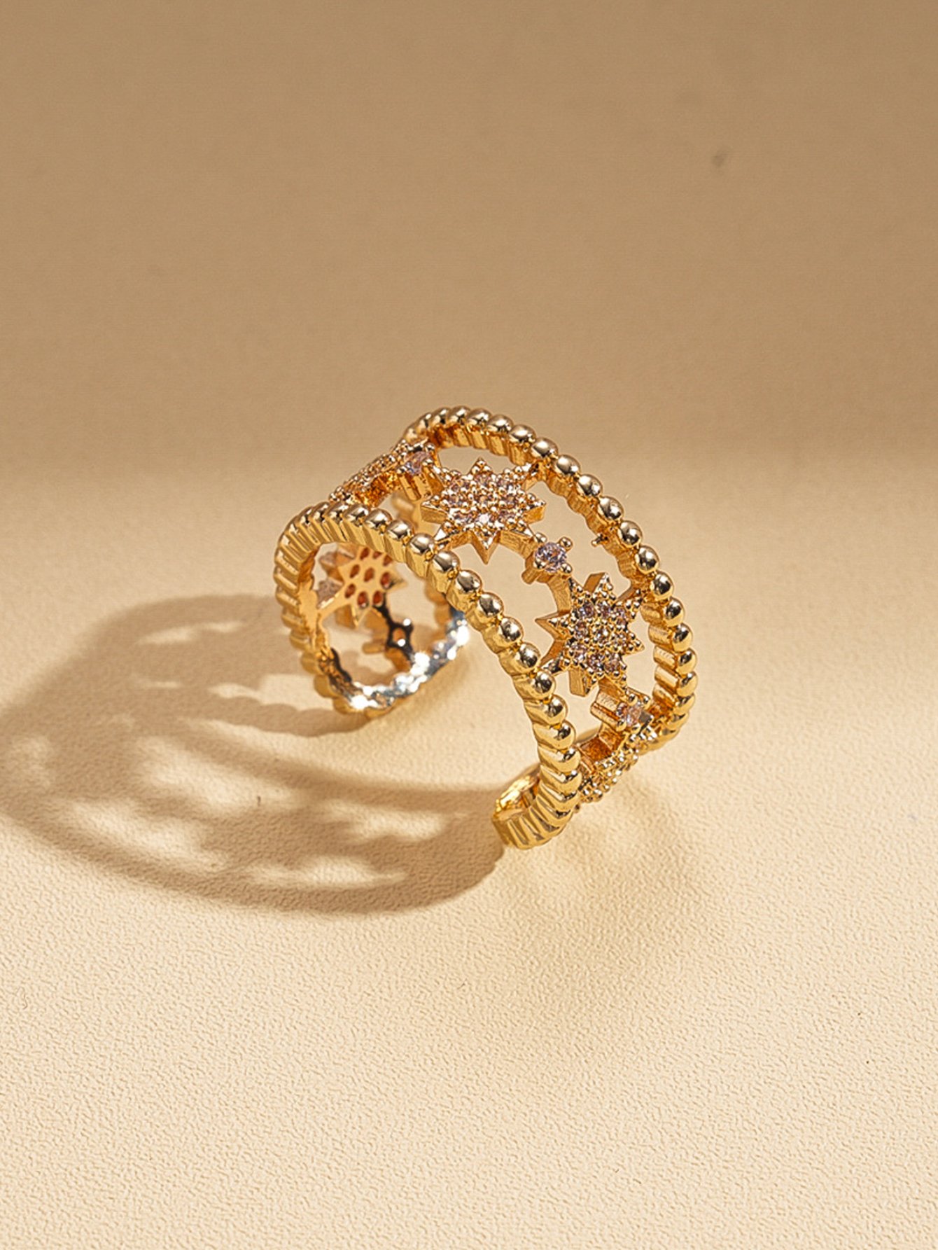 Gold Tone Starburst Motif Ring