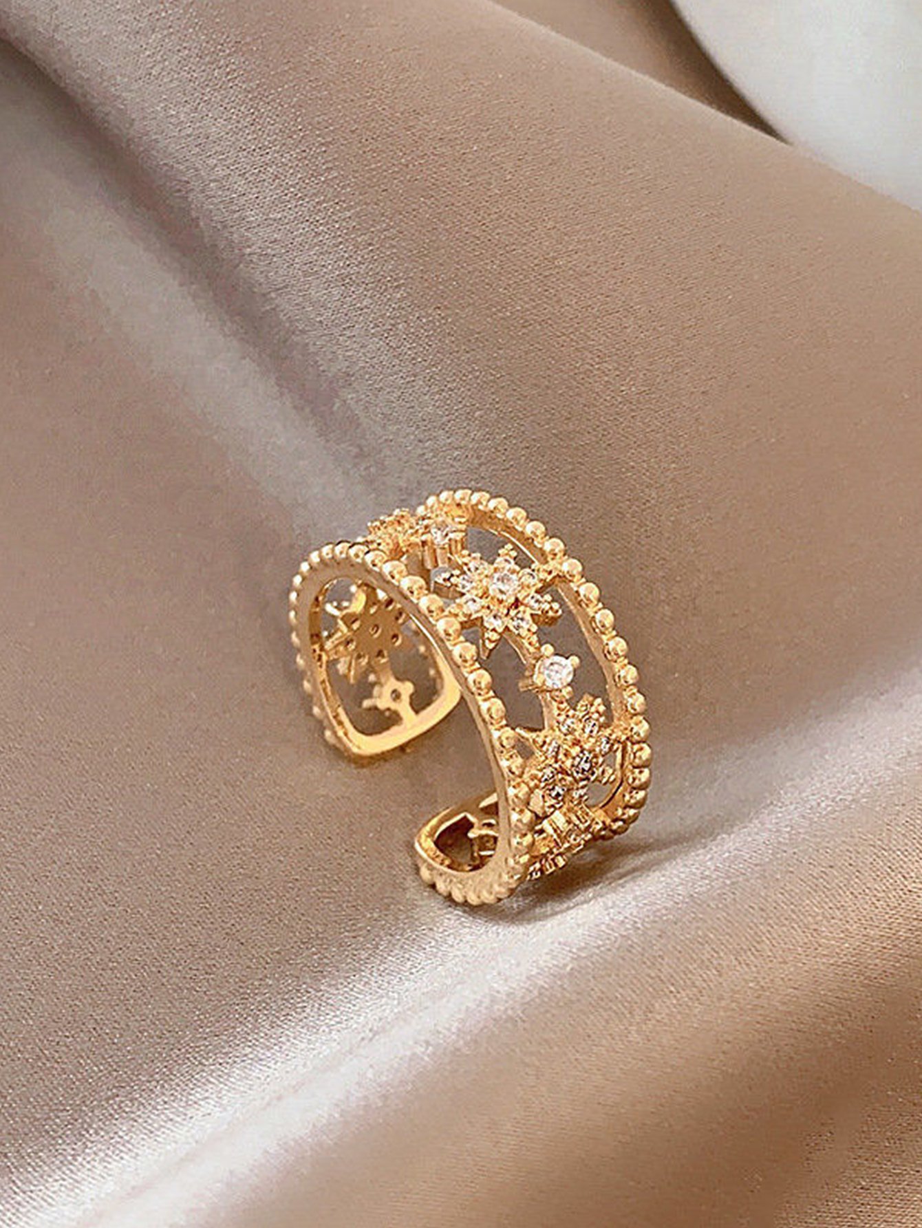 Gold Tone Starburst Motif Ring