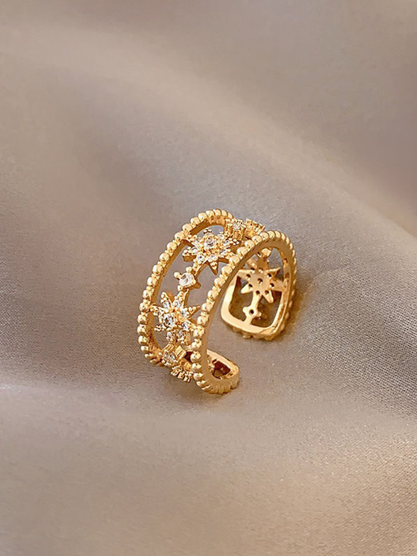 Gold Tone Starburst Motif Ring