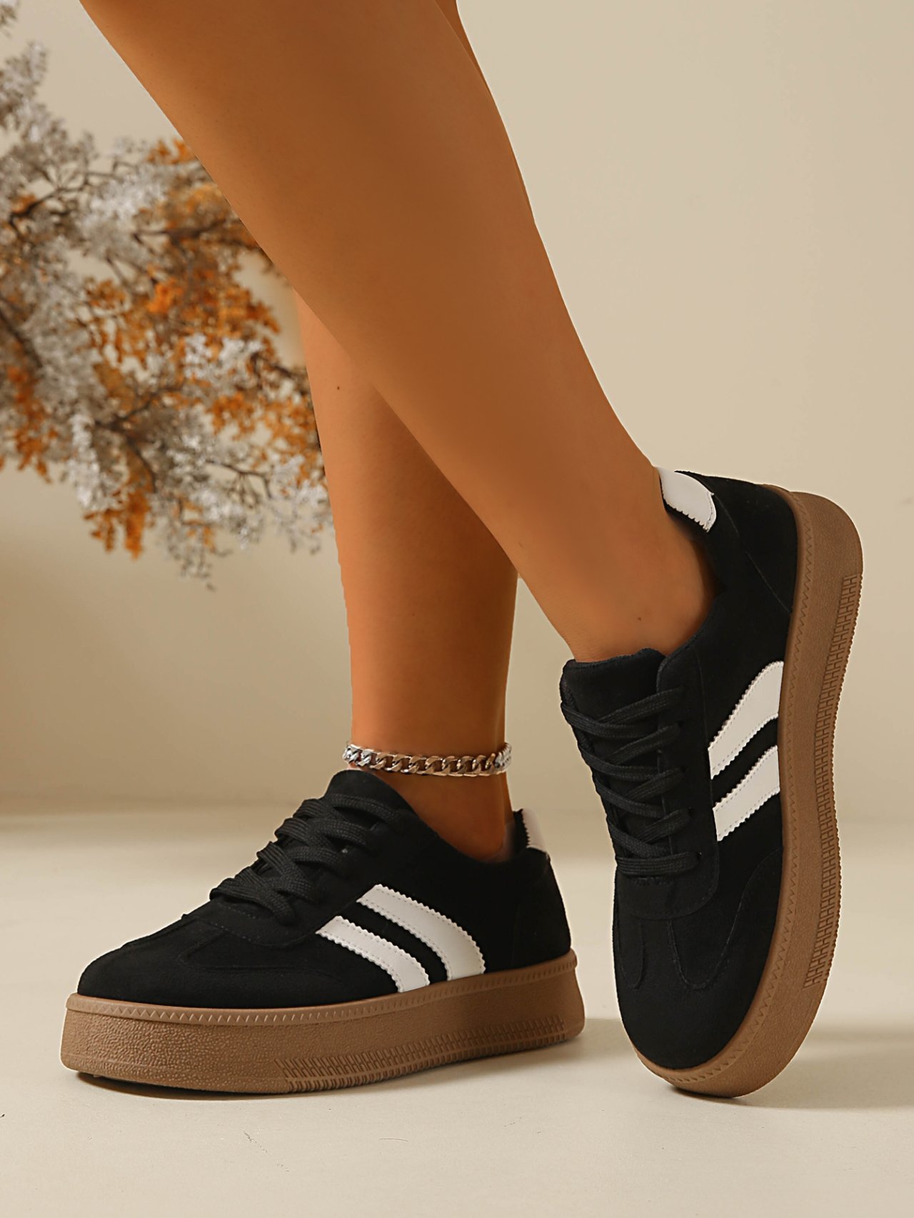 Women Black Flat Sneakers with White Stripes