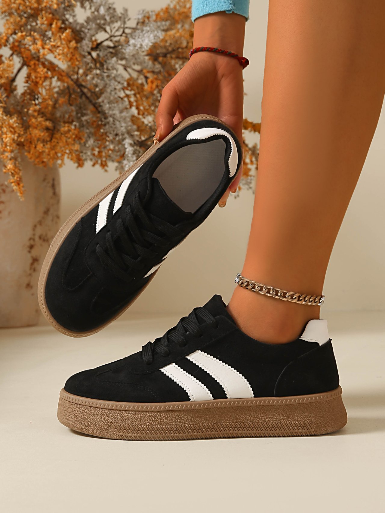 Women Black Flat Sneakers with White Stripes