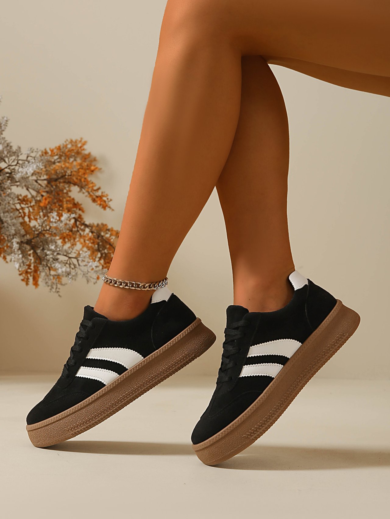 Women Black Flat Sneakers with White Stripes