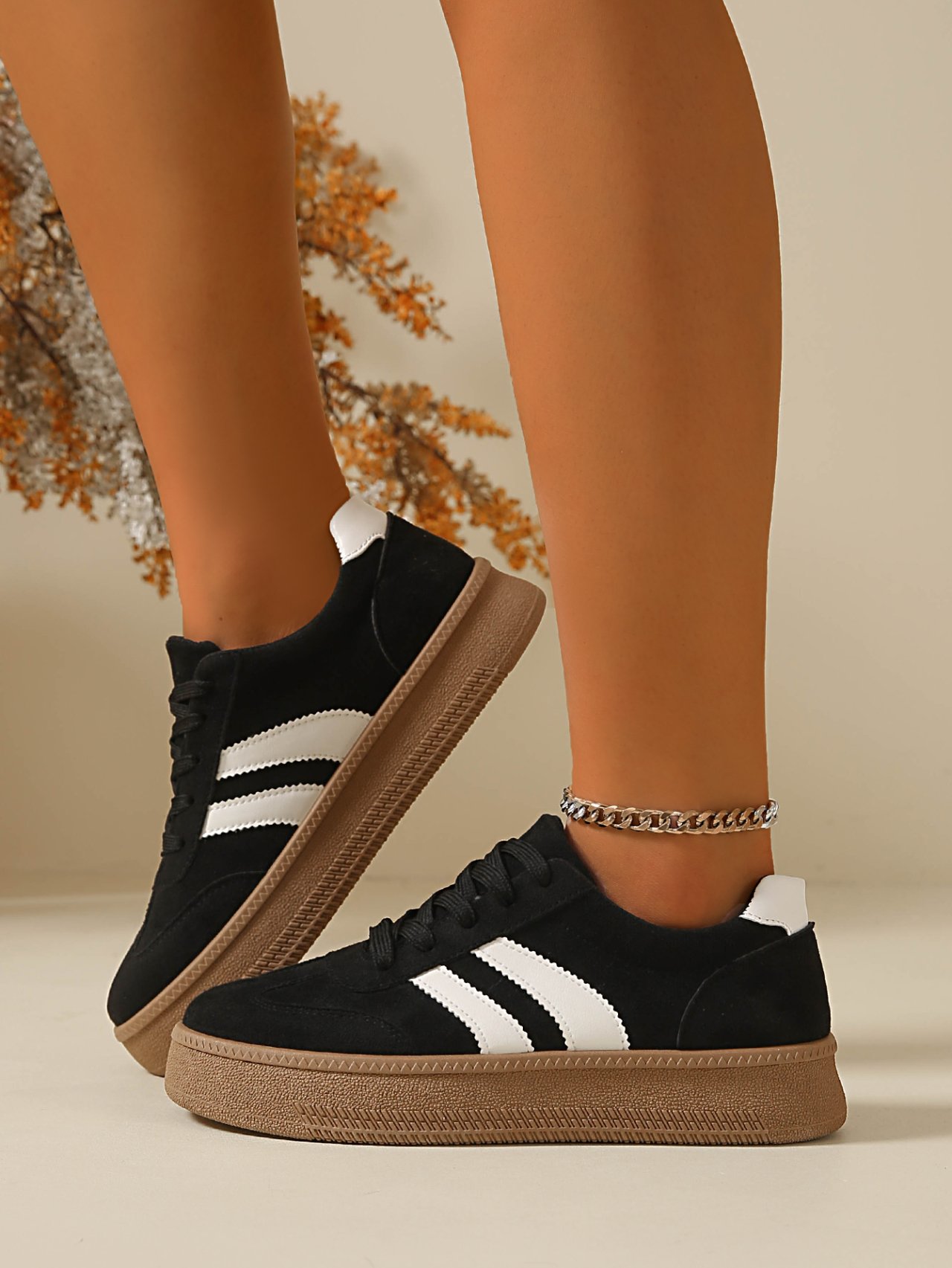 Women Black Flat Sneakers with White Stripes