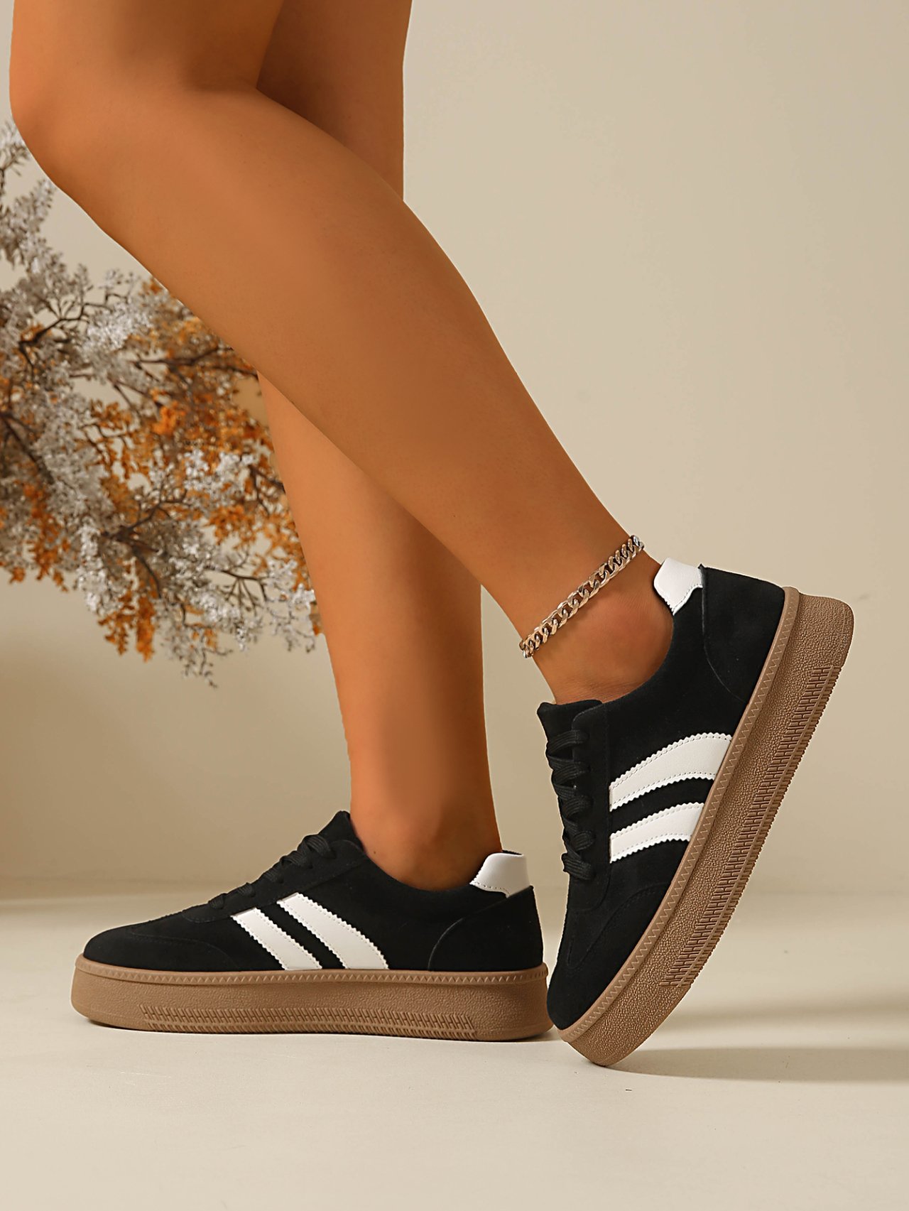 Women Black Flat Sneakers with White Stripes