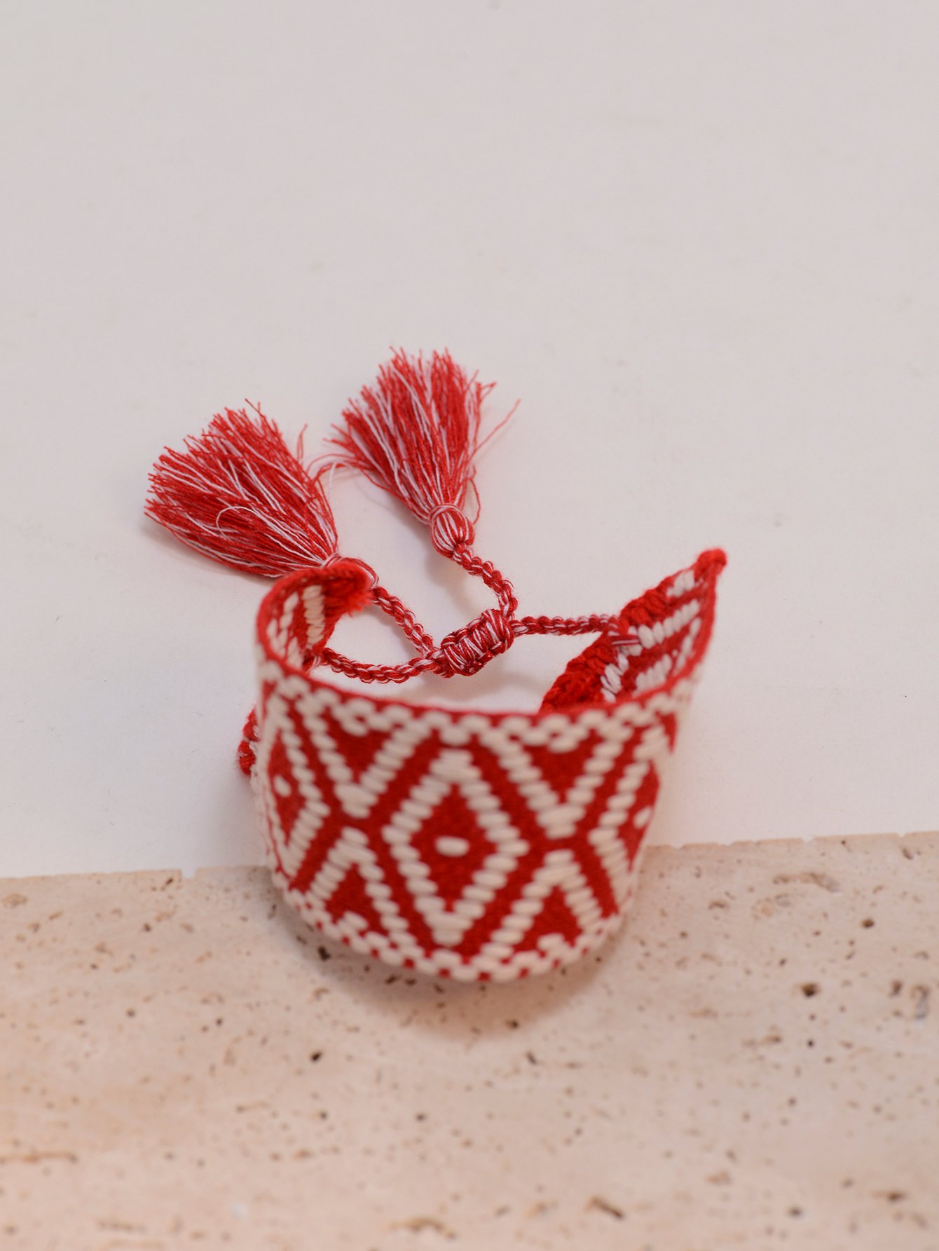 Geometric Pattern Woven Tassel Bracelet