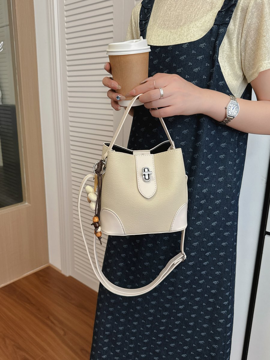 Solid Handbag with Plush Charm