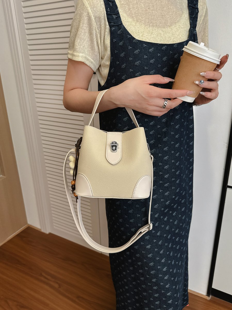 Solid Handbag with Plush Charm
