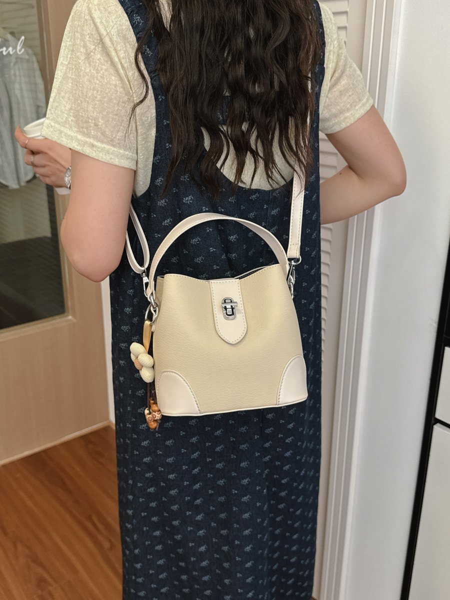 Solid Handbag with Plush Charm
