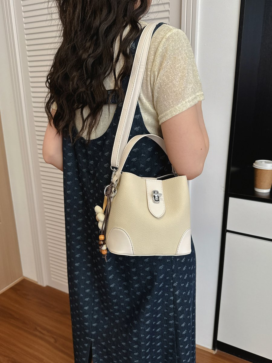 Solid Handbag with Plush Charm